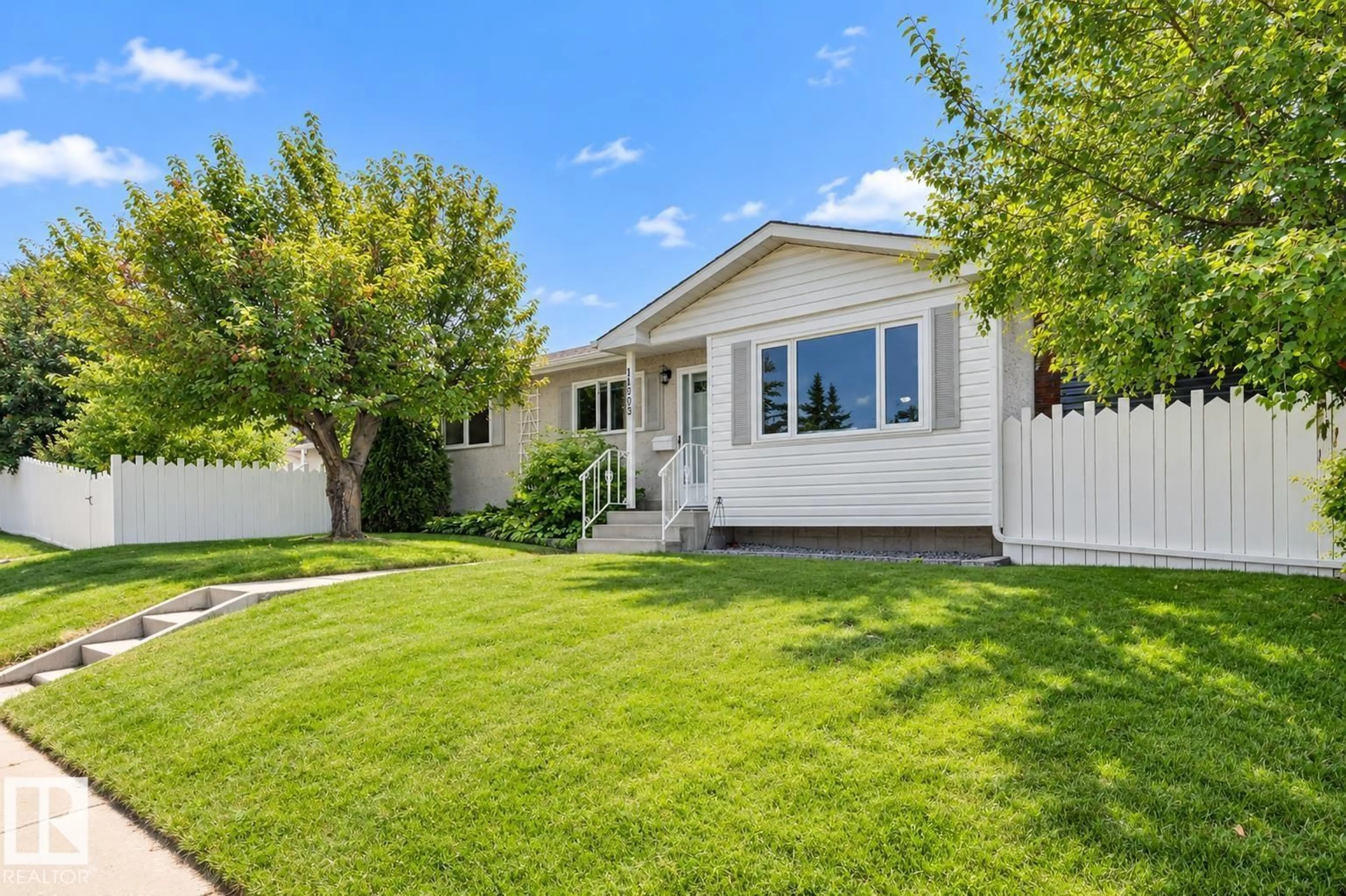 Home with vinyl exterior material, street for 14203 61 ST, Edmonton Alberta T5A1P4