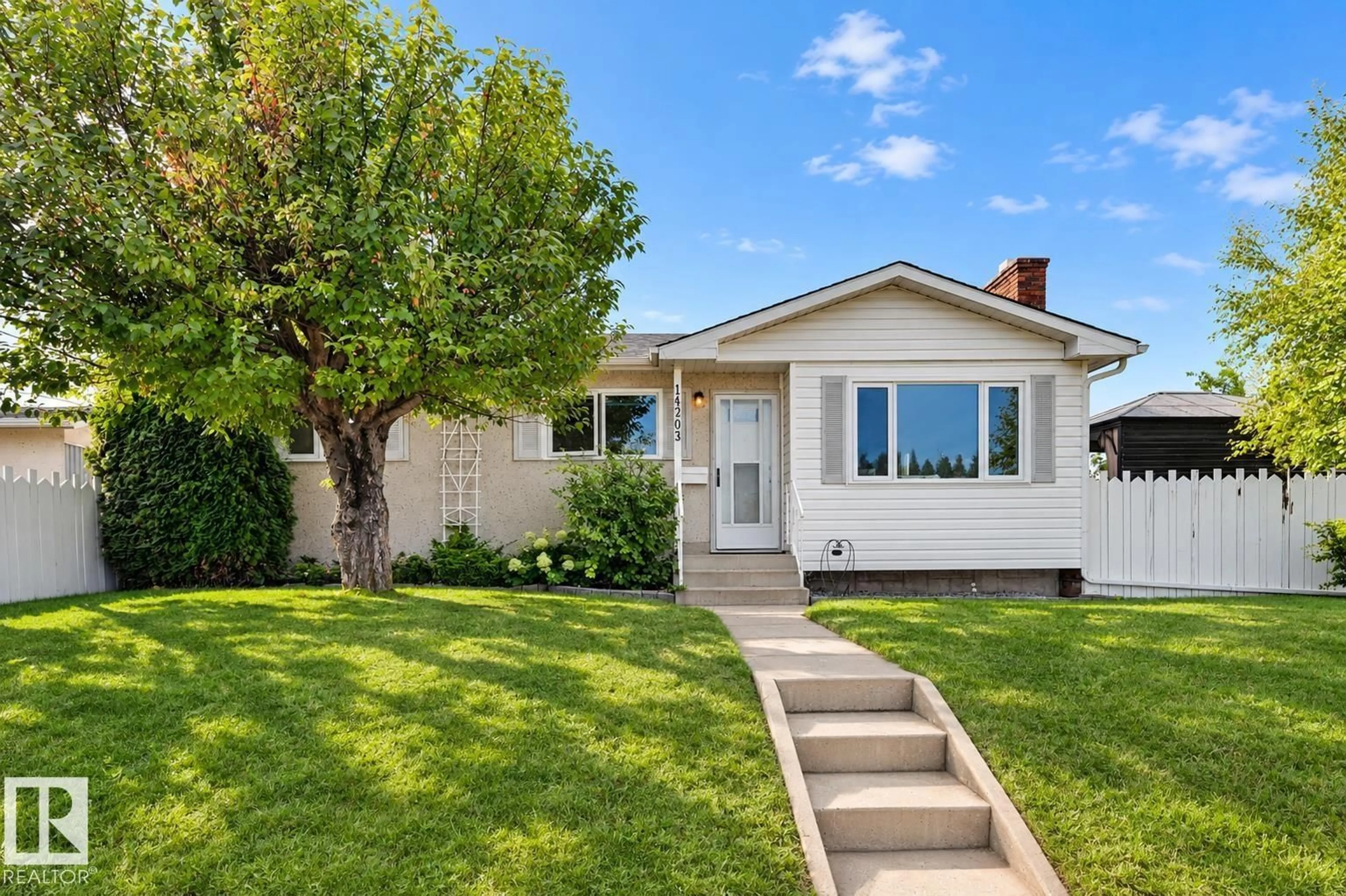 Home with vinyl exterior material, street for 14203 61 ST, Edmonton Alberta T5A1P4