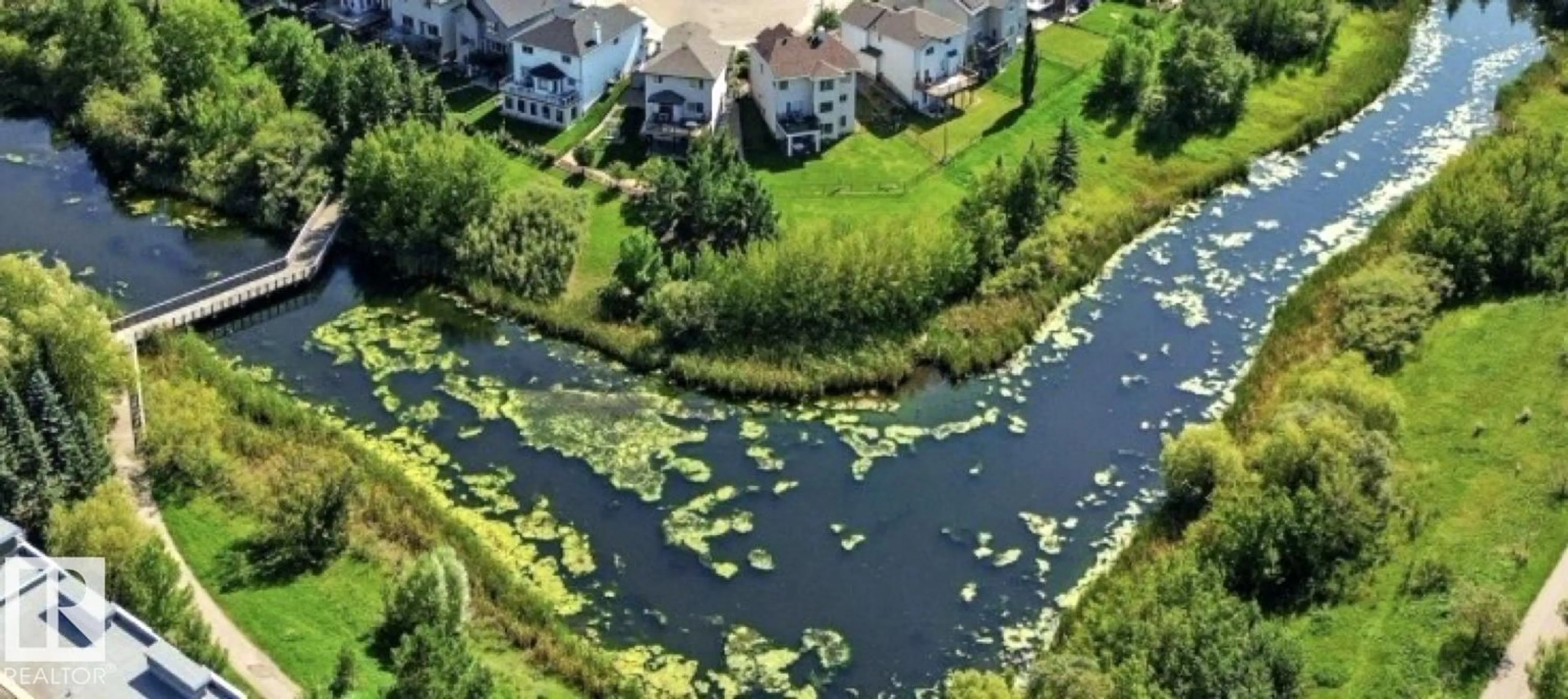 A pic from outside/outdoor area/front of a property/back of a property/a pic from drone, water/lake/river/ocean view for #205 - 11449 ELLERSLIE RD, Edmonton Alberta T6W1T2