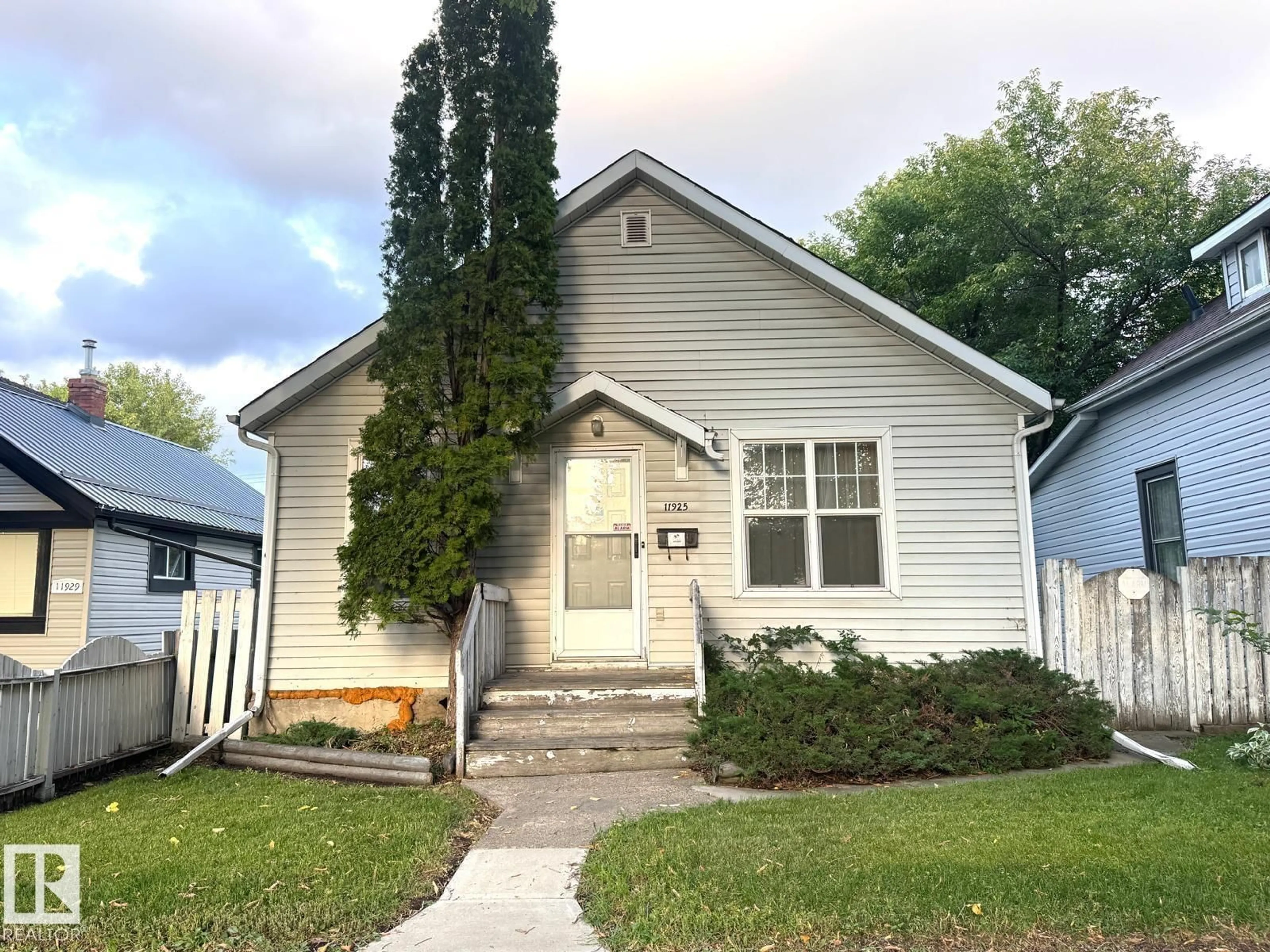 Home with vinyl exterior material, street for NW - 11925 77 ST, Edmonton Alberta T5B2G5