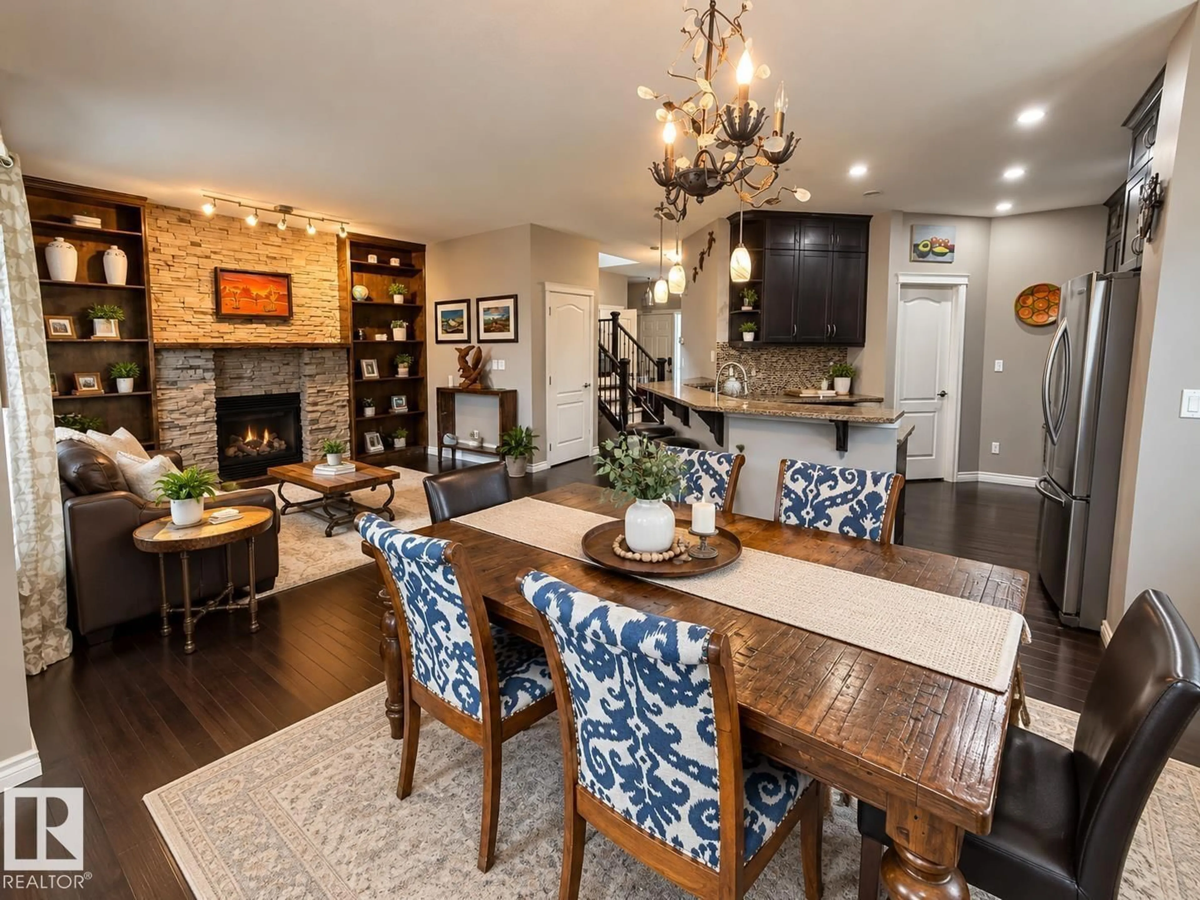 Open concept kitchen, wood/laminate floor for 16893 58A ST, Edmonton Alberta T5Y0N1