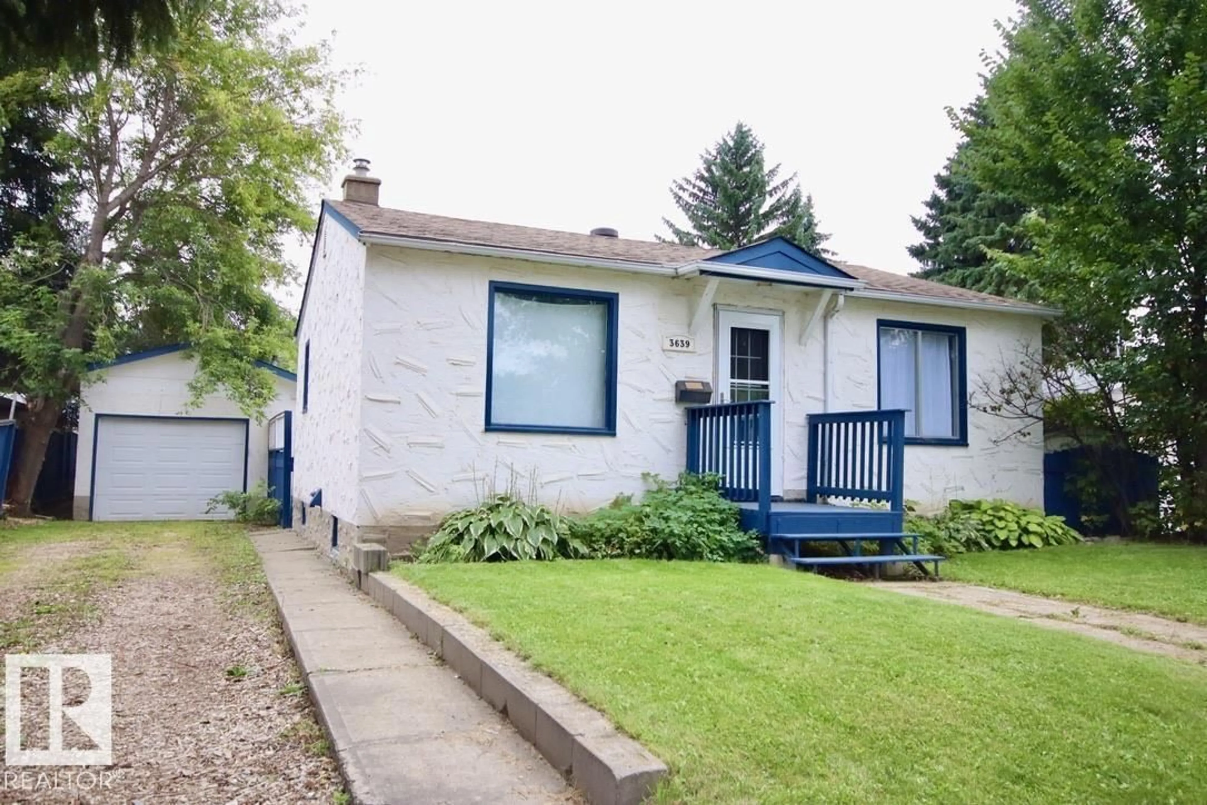 Home with vinyl exterior material, street for 3639 109 AV, Edmonton Alberta T5W0G6