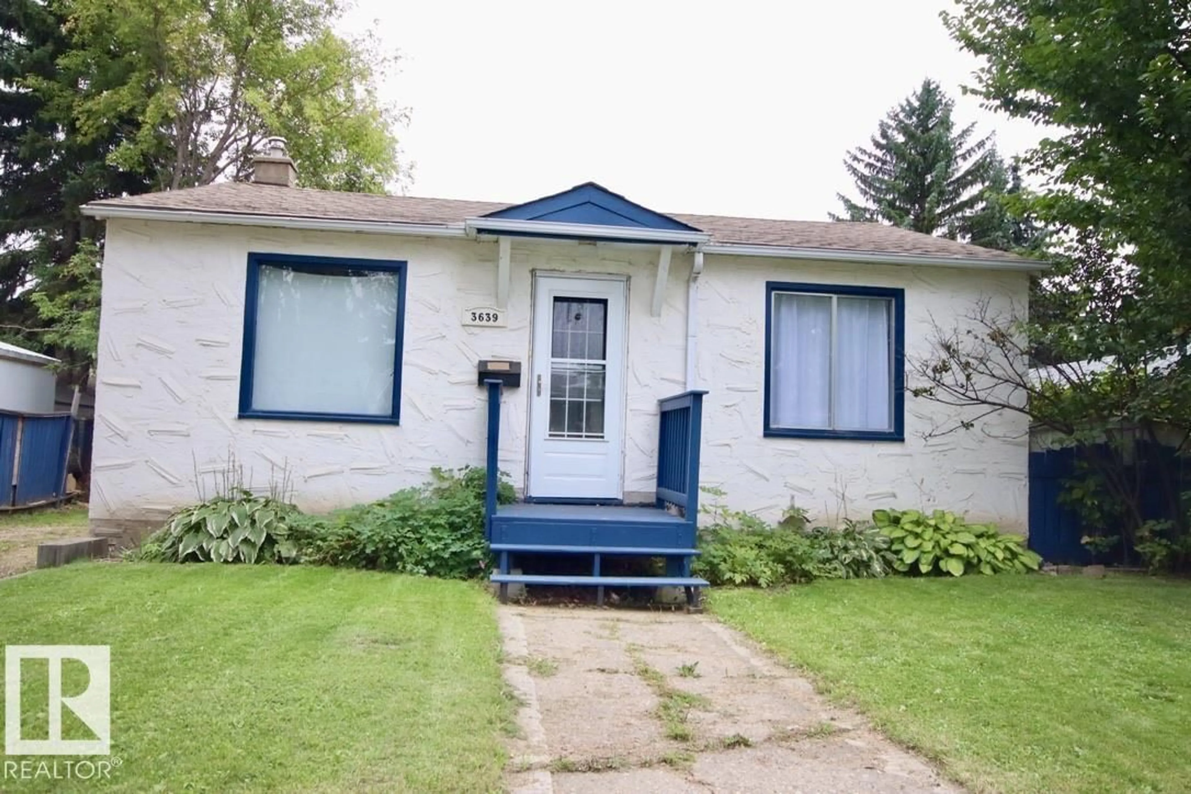 Home with vinyl exterior material, street for 3639 109 AV, Edmonton Alberta T5W0G6