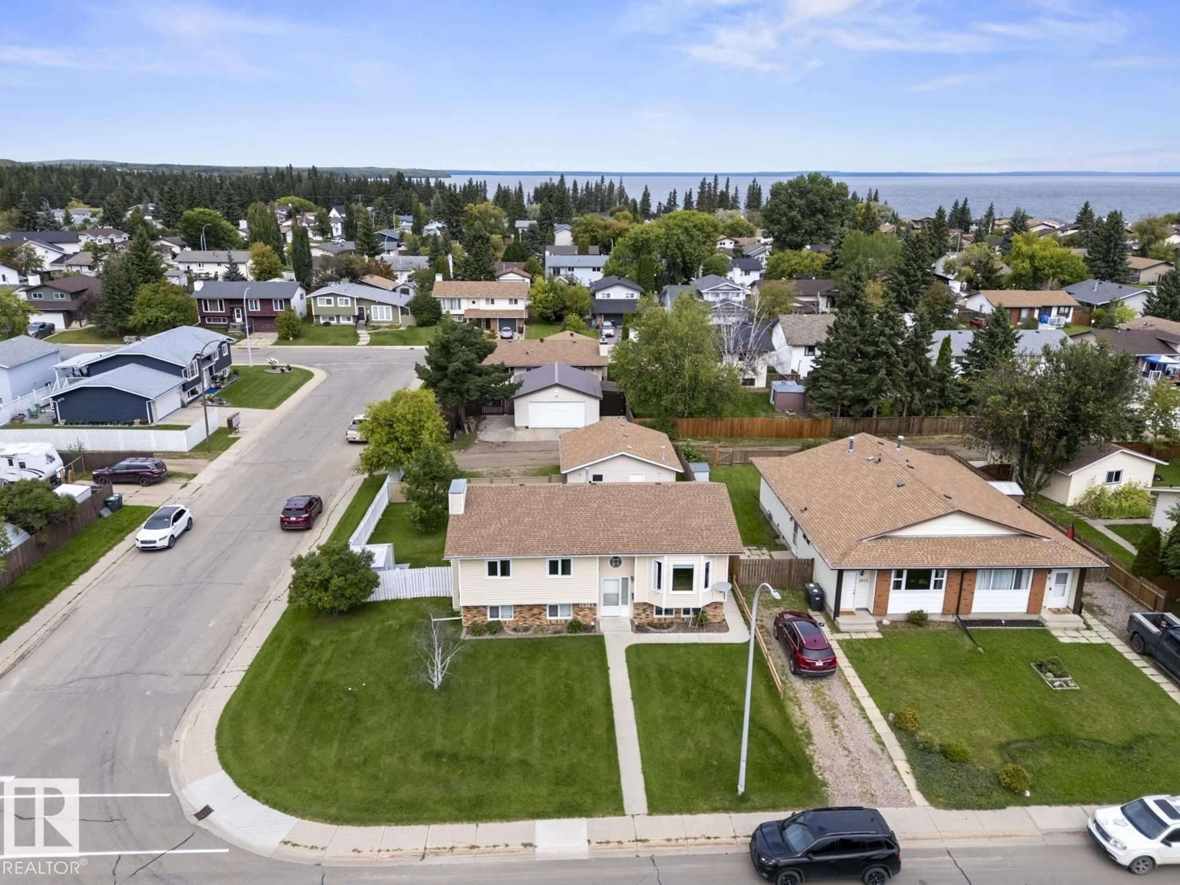 A pic from outside/outdoor area/front of a property/back of a property/a pic from drone, water/lake/river/ocean view for 2018 5 AV, Cold Lake Alberta T9M1G1
