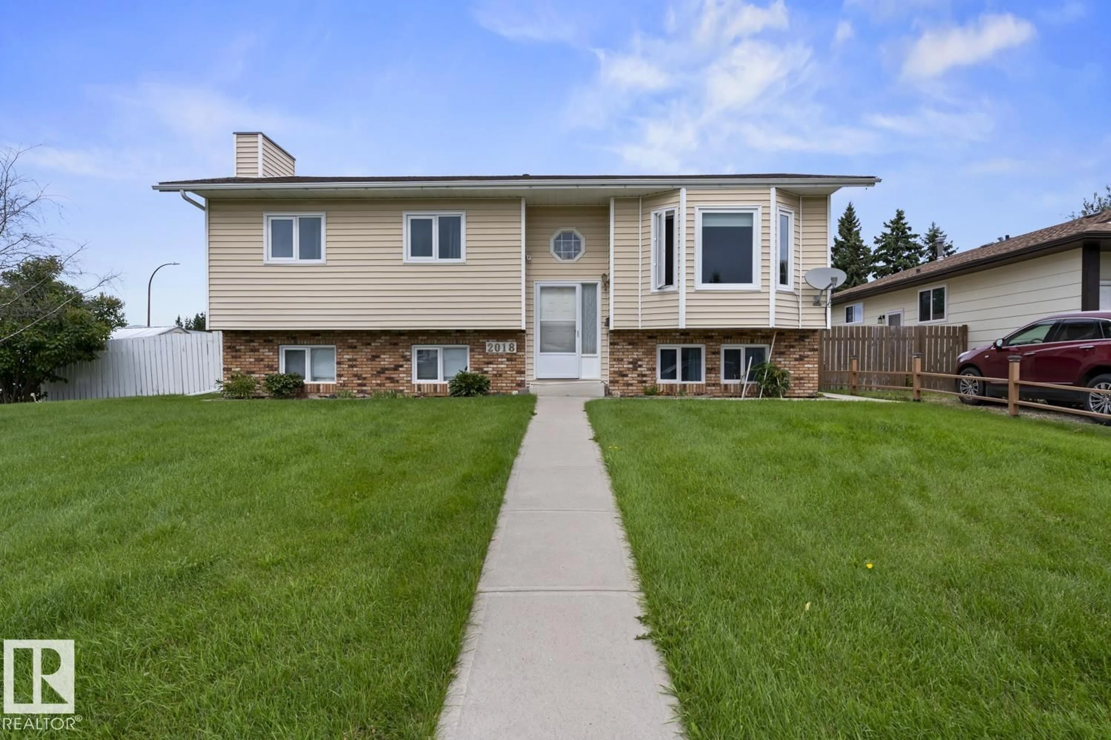 Home with vinyl exterior material, street for 2018 5 AV, Cold Lake Alberta T9M1G1