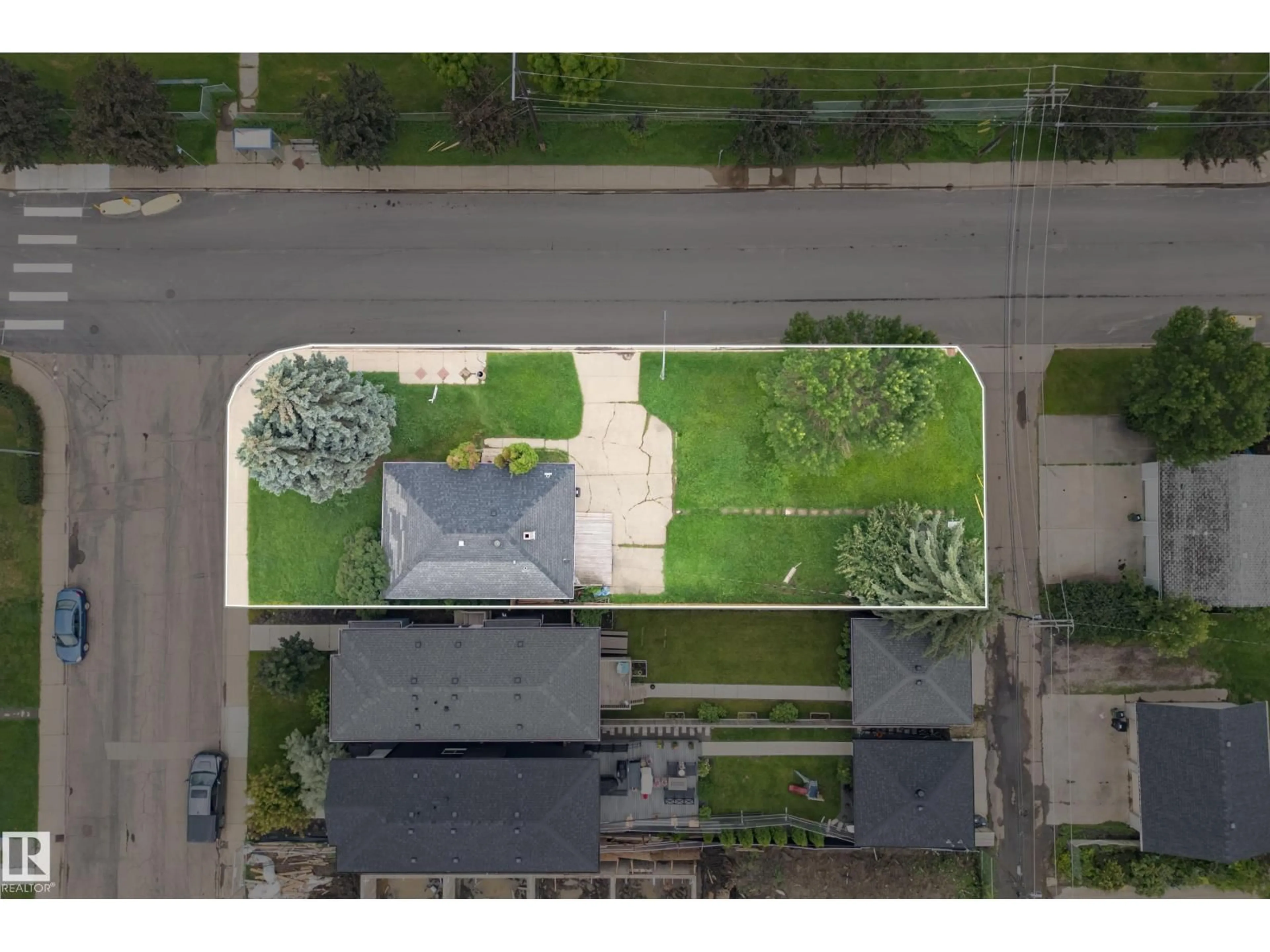 A pic from outside/outdoor area/front of a property/back of a property/a pic from drone, street for NW - 15321 110 AV, Edmonton Alberta T5P1E4