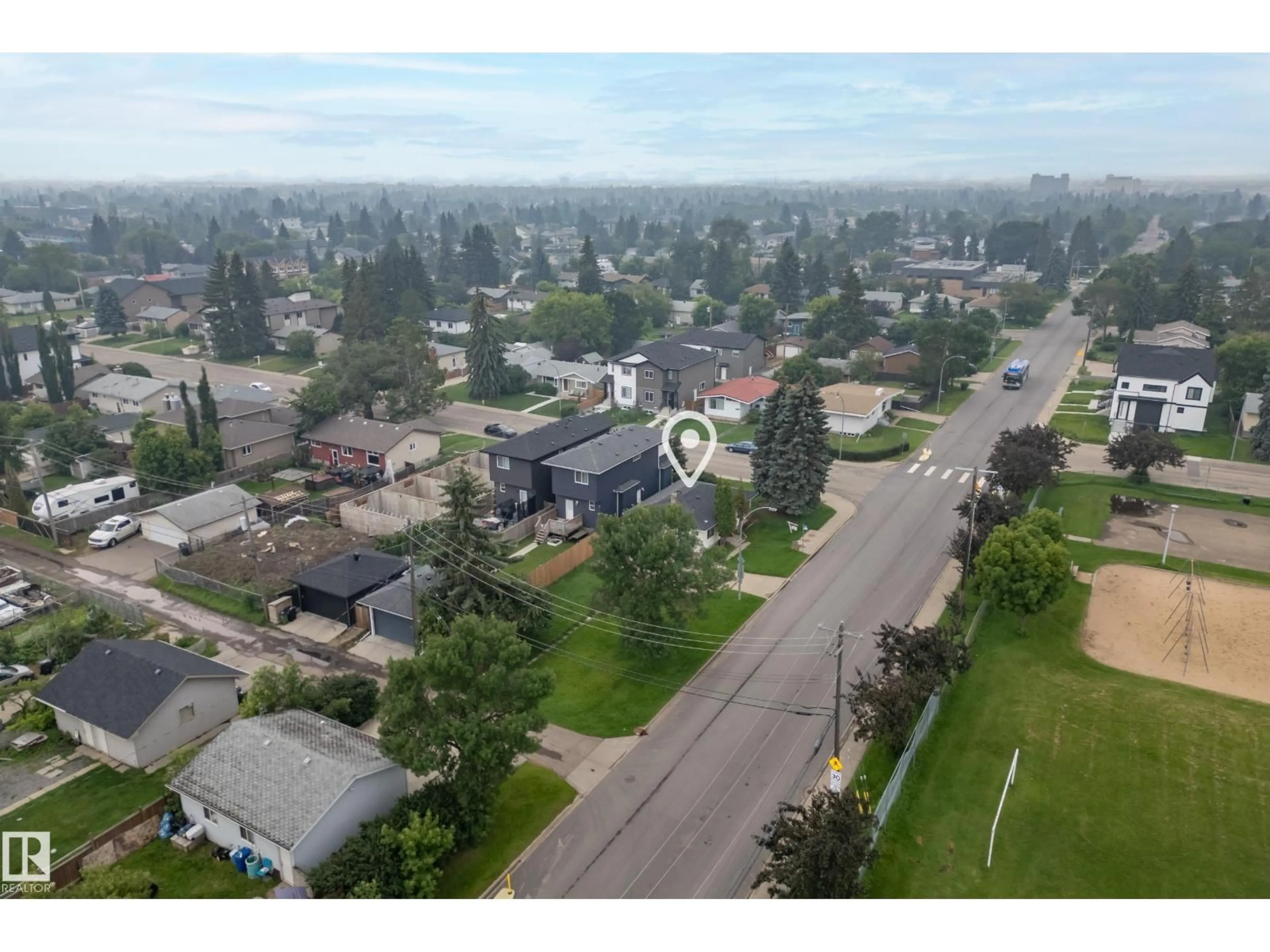 A pic from outside/outdoor area/front of a property/back of a property/a pic from drone, street for NW - 15321 110 AV, Edmonton Alberta T5P1E4
