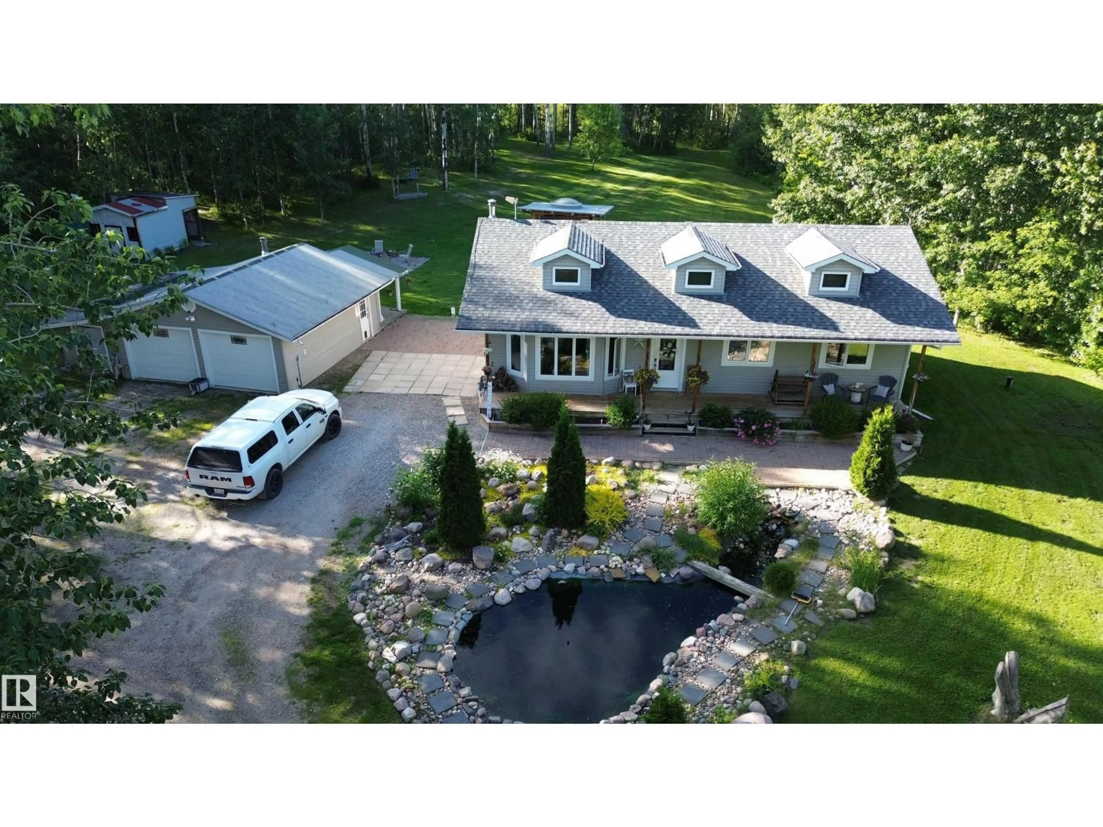 A pic from outside/outdoor area/front of a property/back of a property/a pic from drone, water/lake/river/ocean view for 53304 - 132 RGE ROAD 30, Rural Parkland County Alberta T7Y0E2