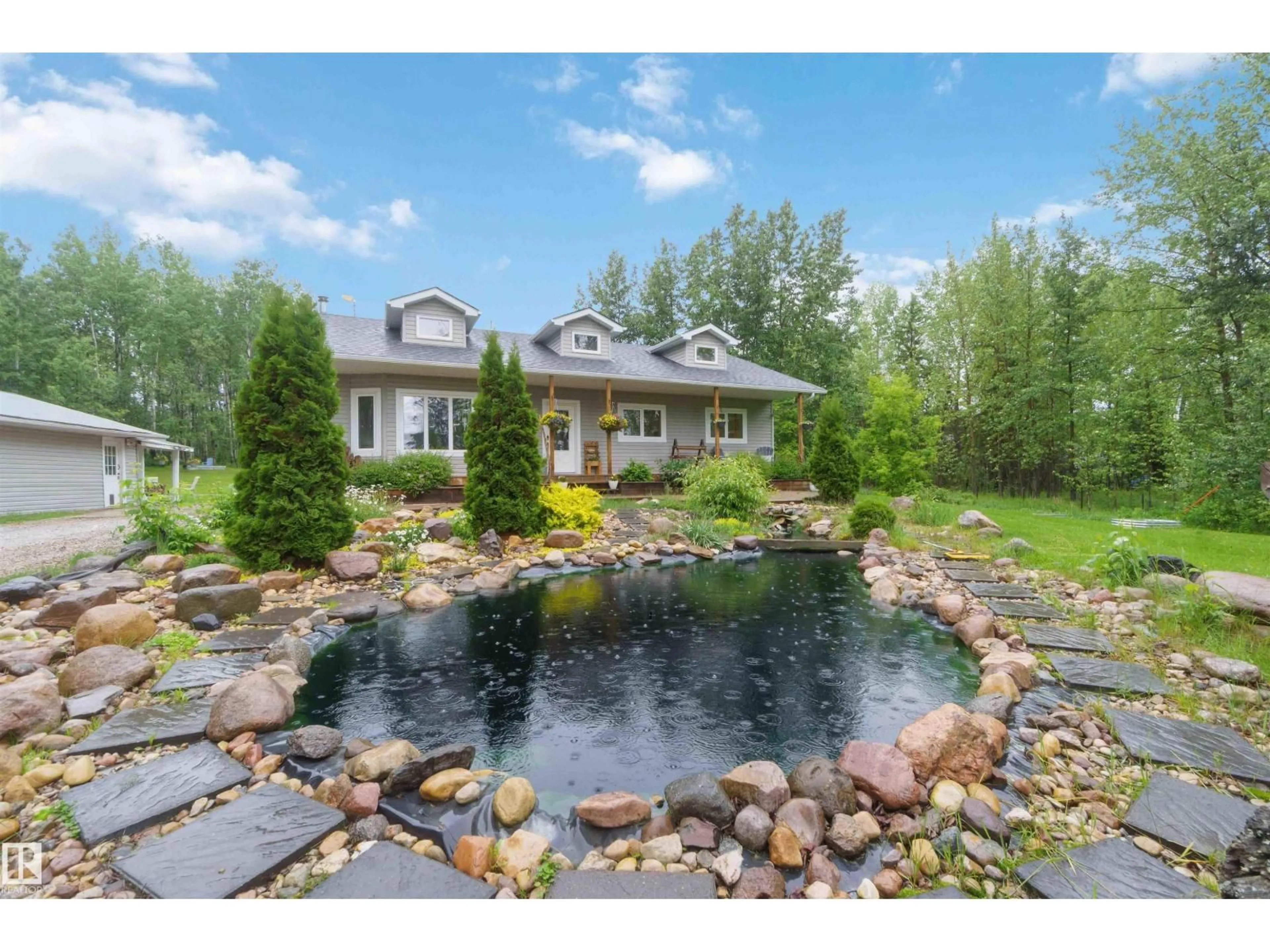 A pic from outside/outdoor area/front of a property/back of a property/a pic from drone, water/lake/river/ocean view for 53304 - 132 RGE ROAD 30, Rural Parkland County Alberta T7Y0E2