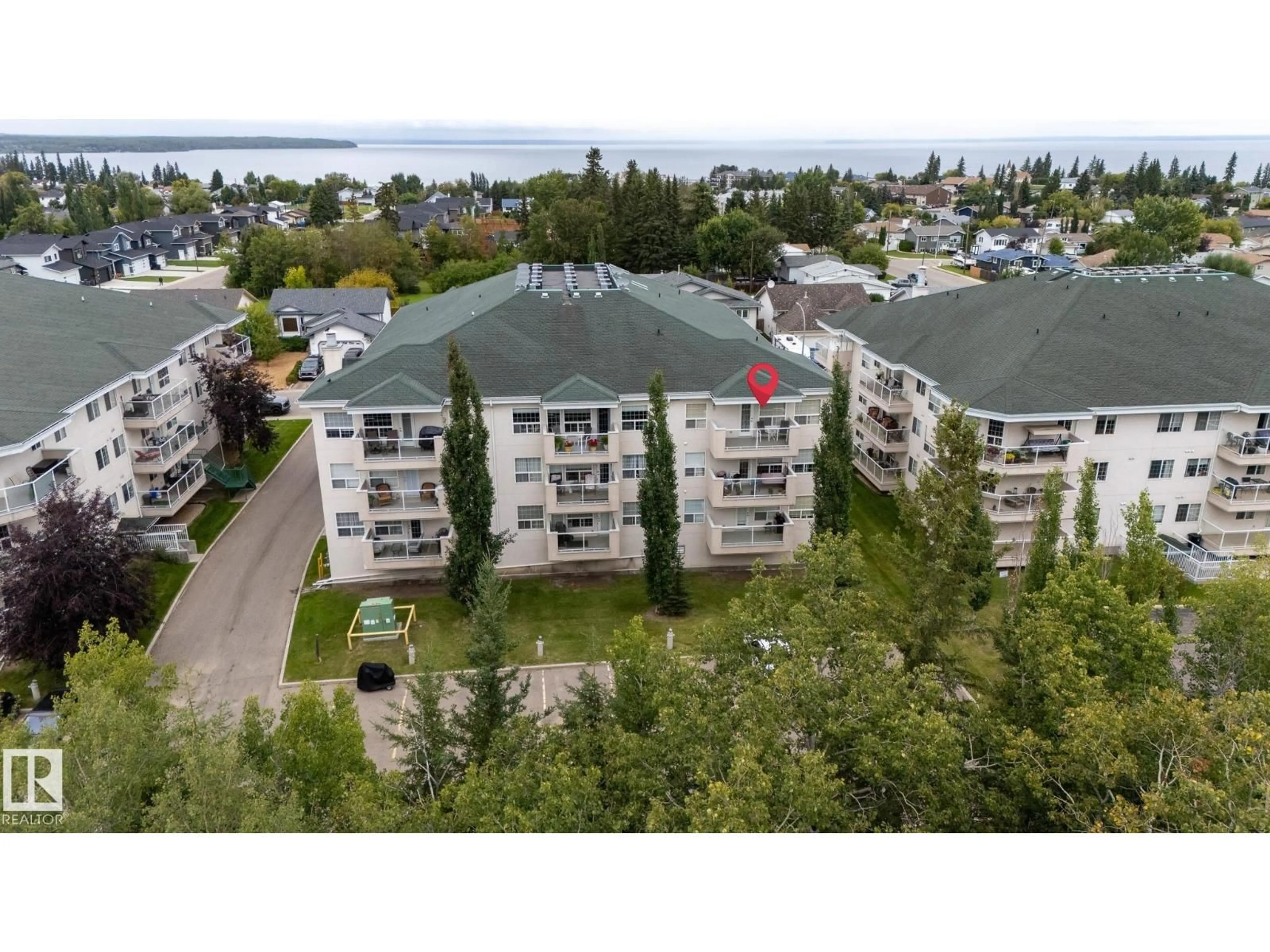 A pic from outside/outdoor area/front of a property/back of a property/a pic from drone, unknown for #304 - 1605 7 AV, Cold Lake Alberta T9M0A6