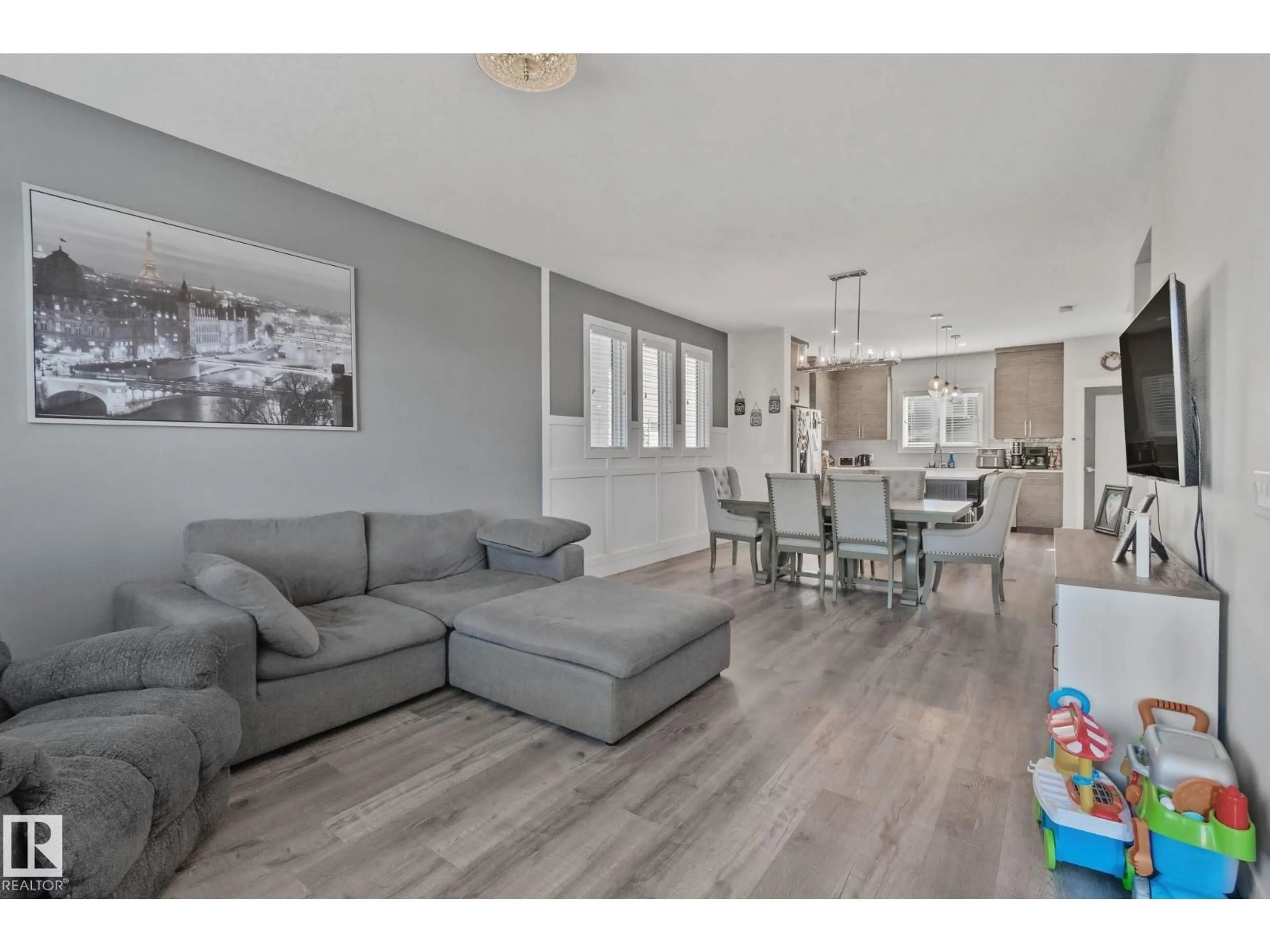 Living room with furniture, wood/laminate floor for 387 WEST HAVEN DR, Leduc Alberta T9E1J3