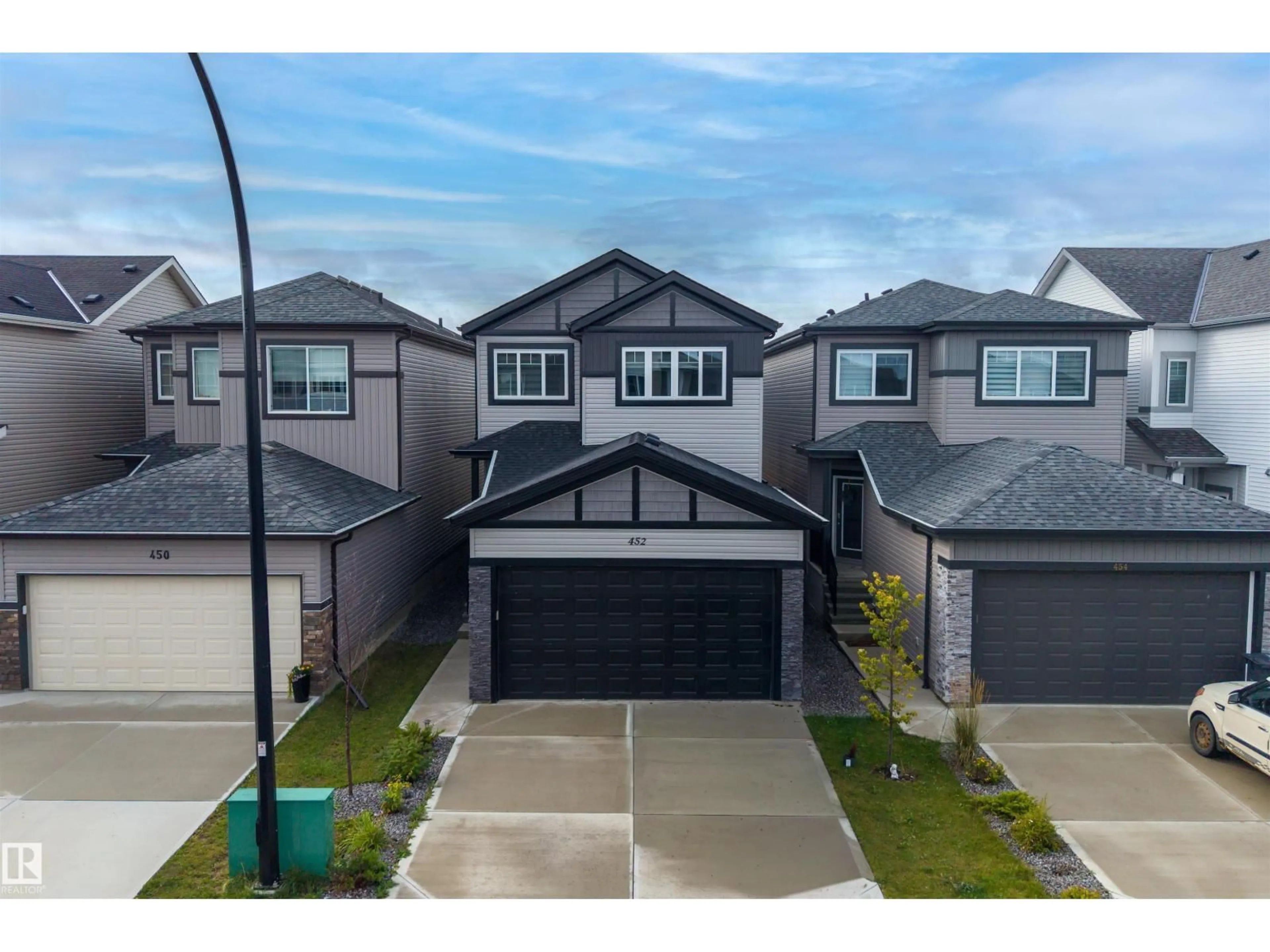A pic from outside/outdoor area/front of a property/back of a property/a pic from drone, street for 452 ROBERTS CR, Leduc Alberta T9E1N4