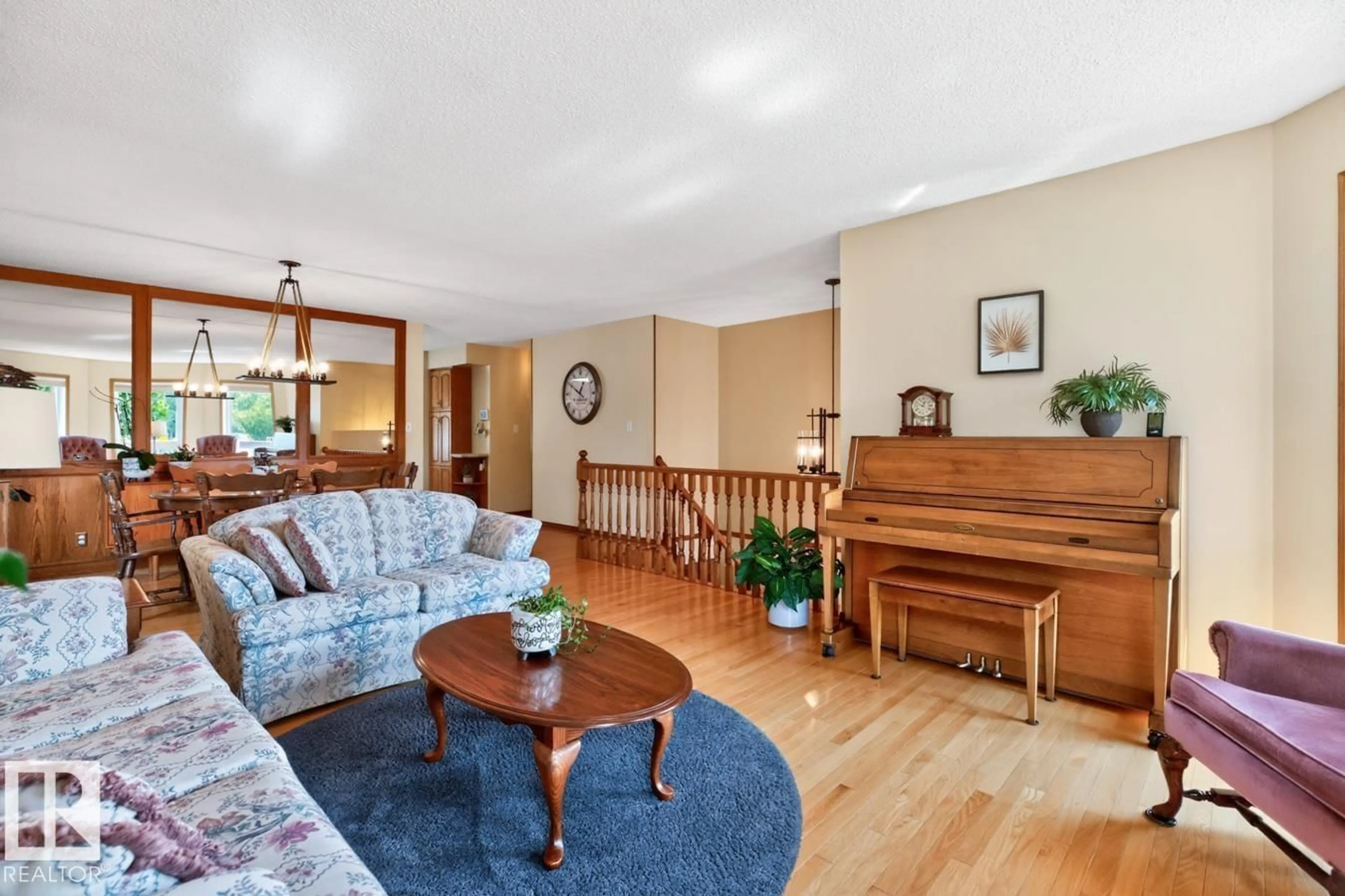 Living room with furniture, wood/laminate floor for 133 MEADOWVIEW DR, Sherwood Park Alberta T8H1P8
