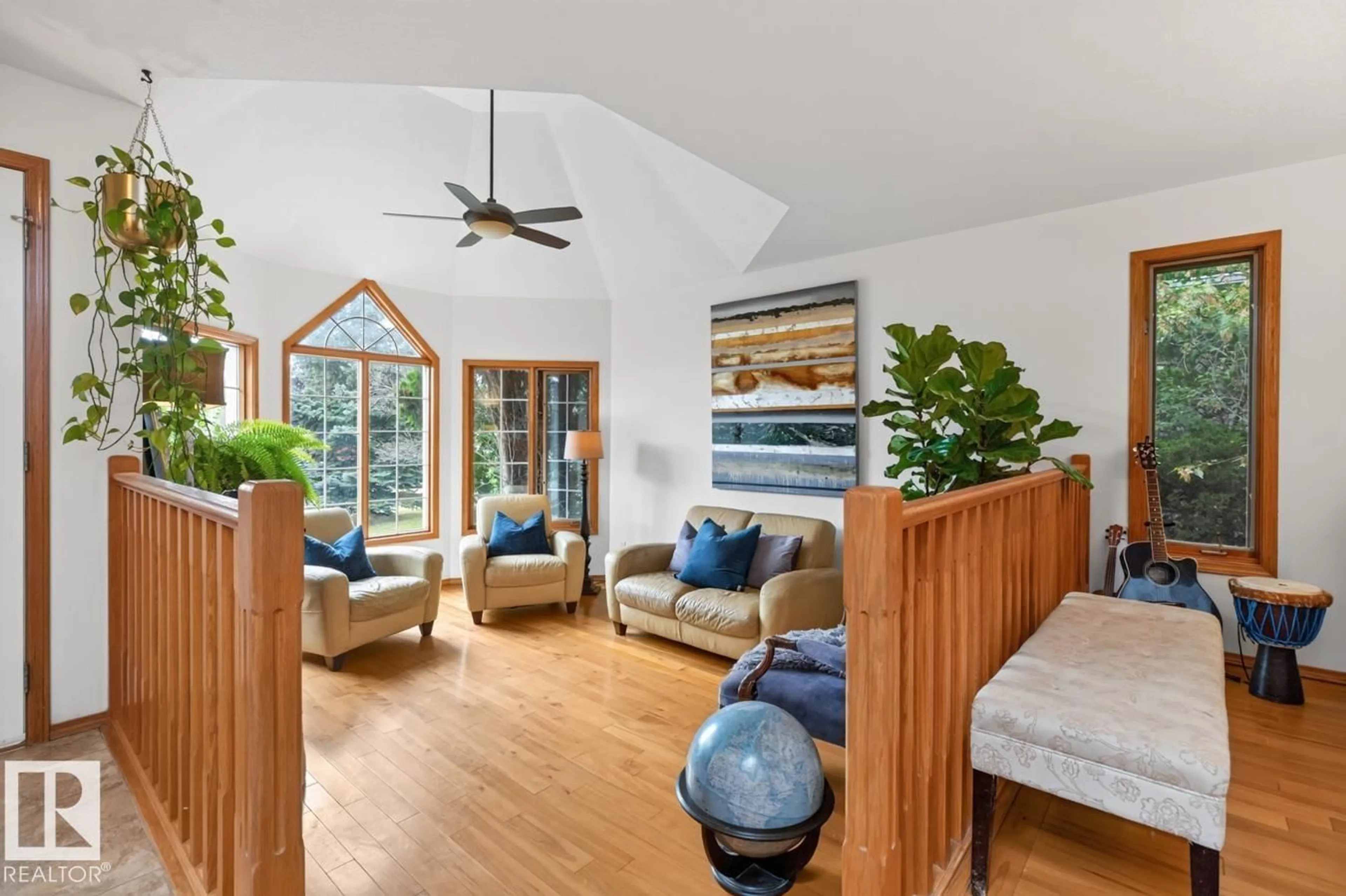 Living room with furniture, wood/laminate floor for 14 NEWPORT DR, Sherwood Park Alberta T8A5L3