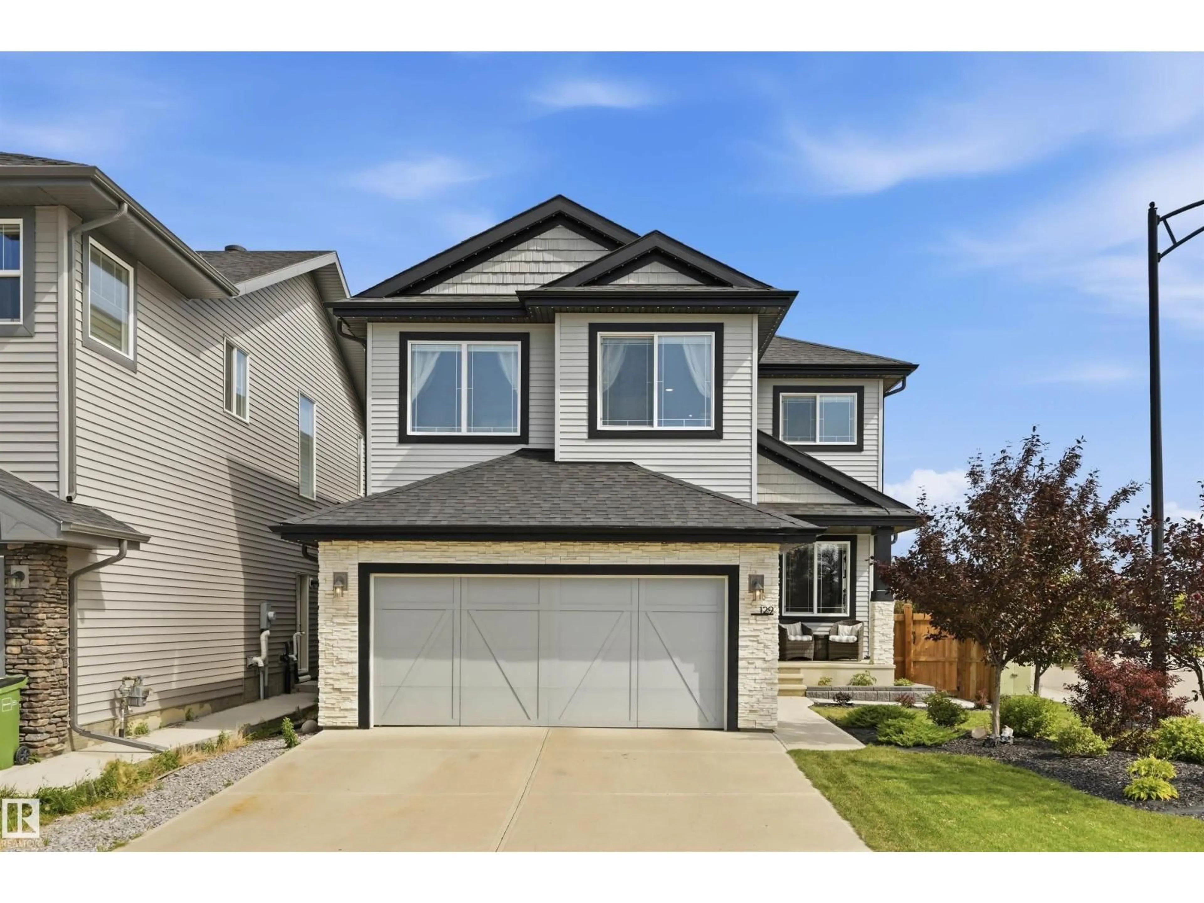 Home with vinyl exterior material, street for 129 GLENRIDDING RAVINE RD, Edmonton Alberta T6W4K8