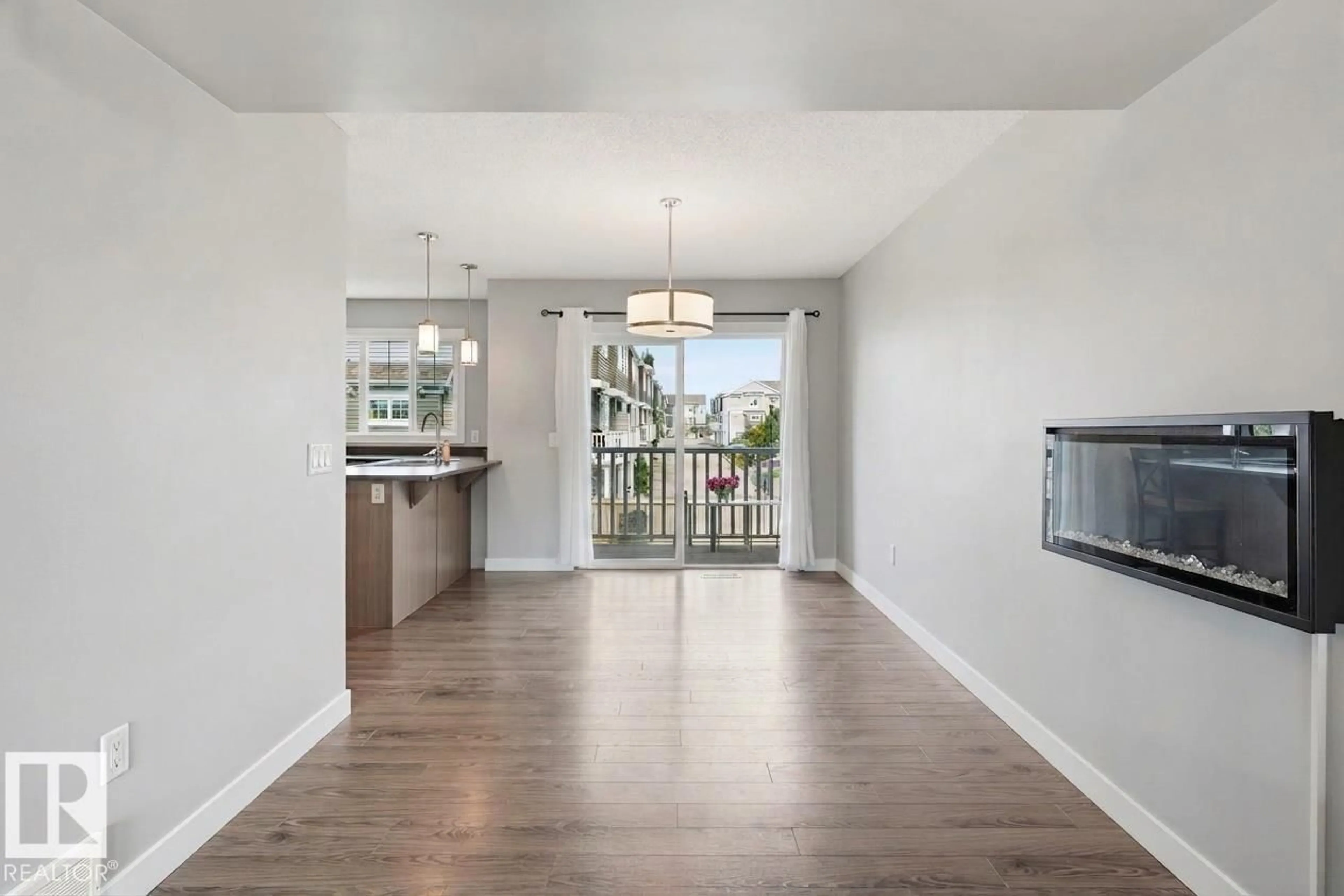 Open concept kitchen, wood/laminate floor for #12 - 1391 STARLING DR, Edmonton Alberta T5V1T7