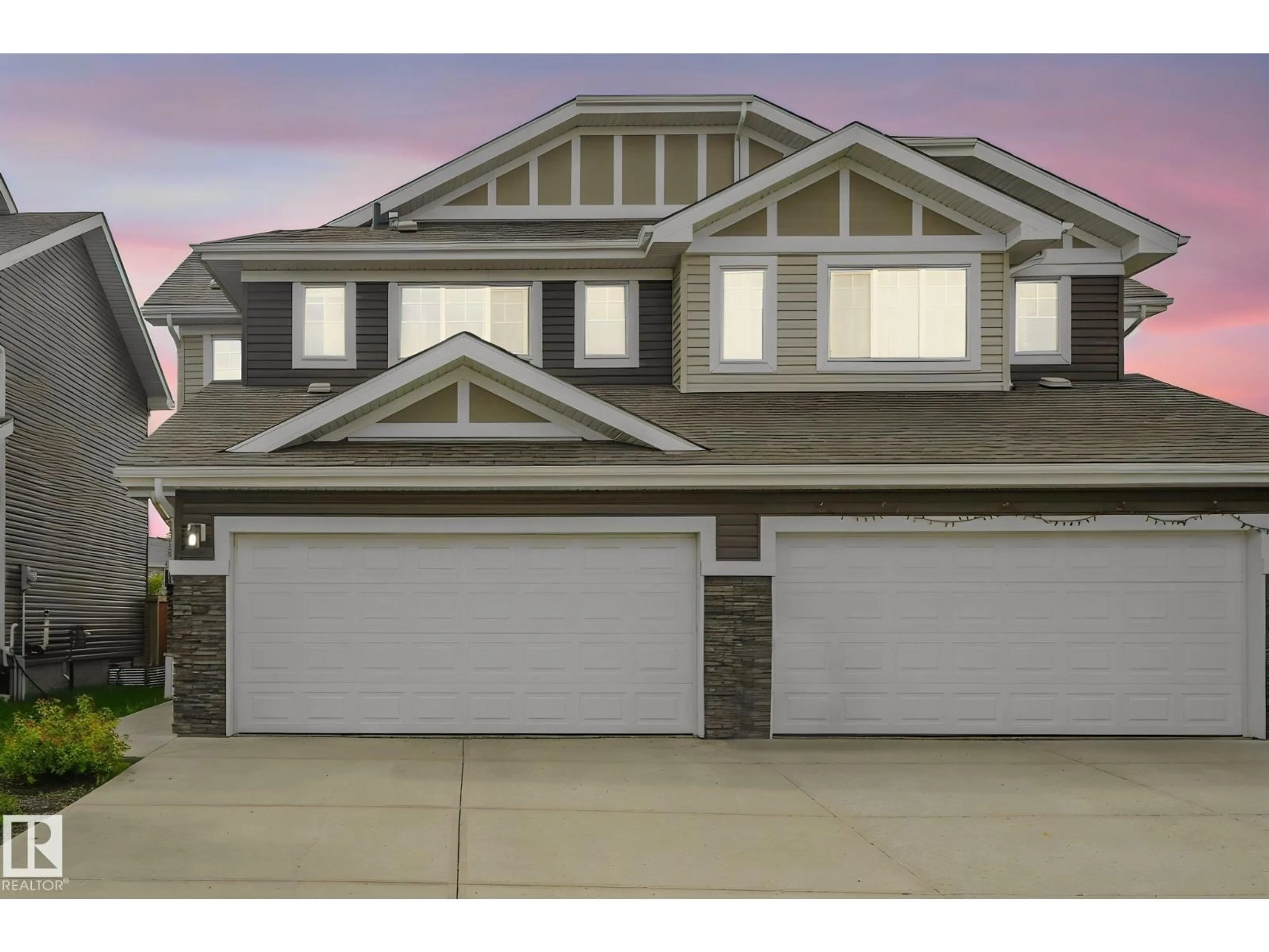 Home with vinyl exterior material, street for SW - 16619 14 AV, Edmonton Alberta T6W3C3