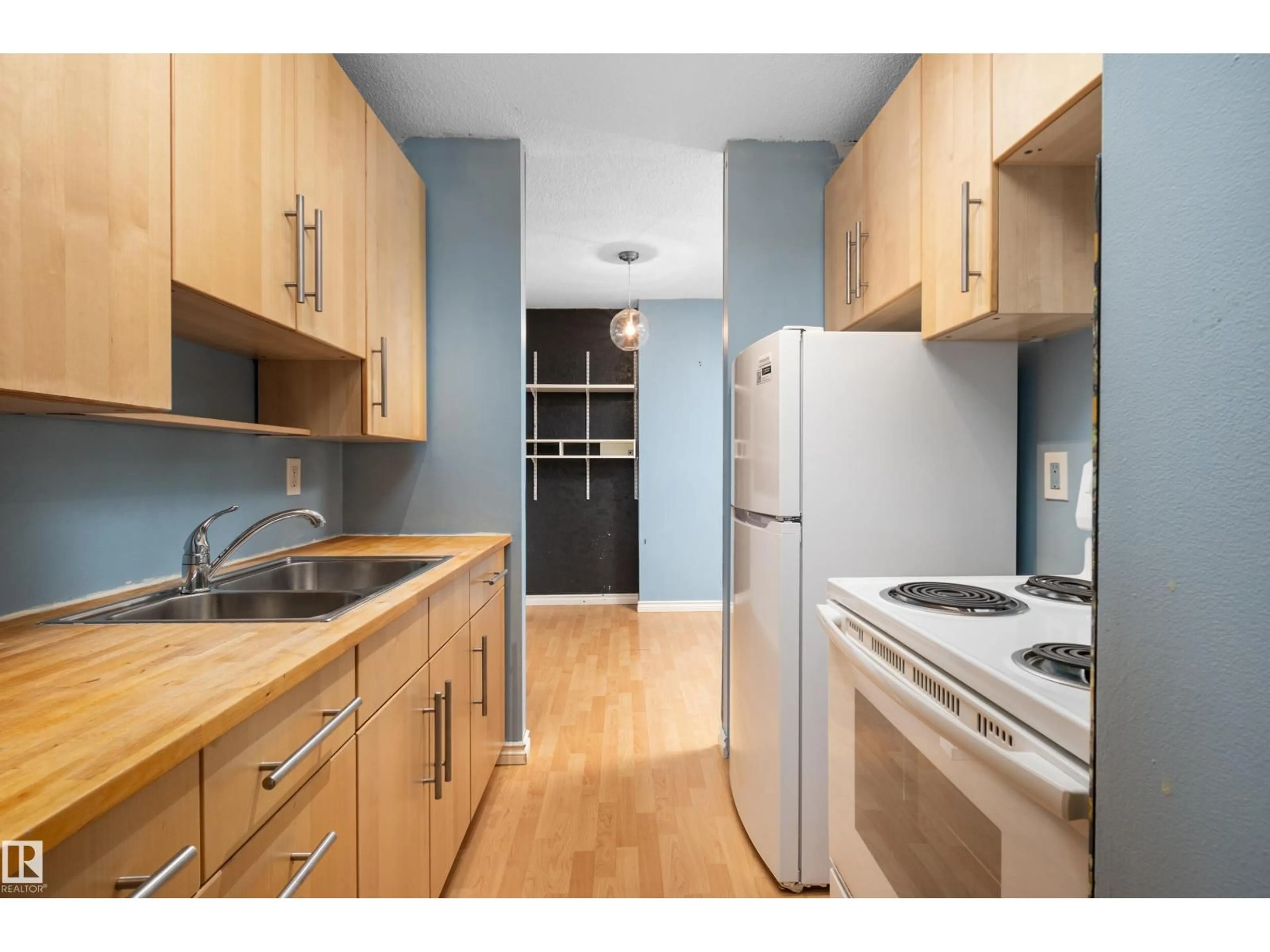 Standard kitchen, wood/laminate floor for 13910 - 611 STONY PLAIN RD, Edmonton Alberta T5N3R2