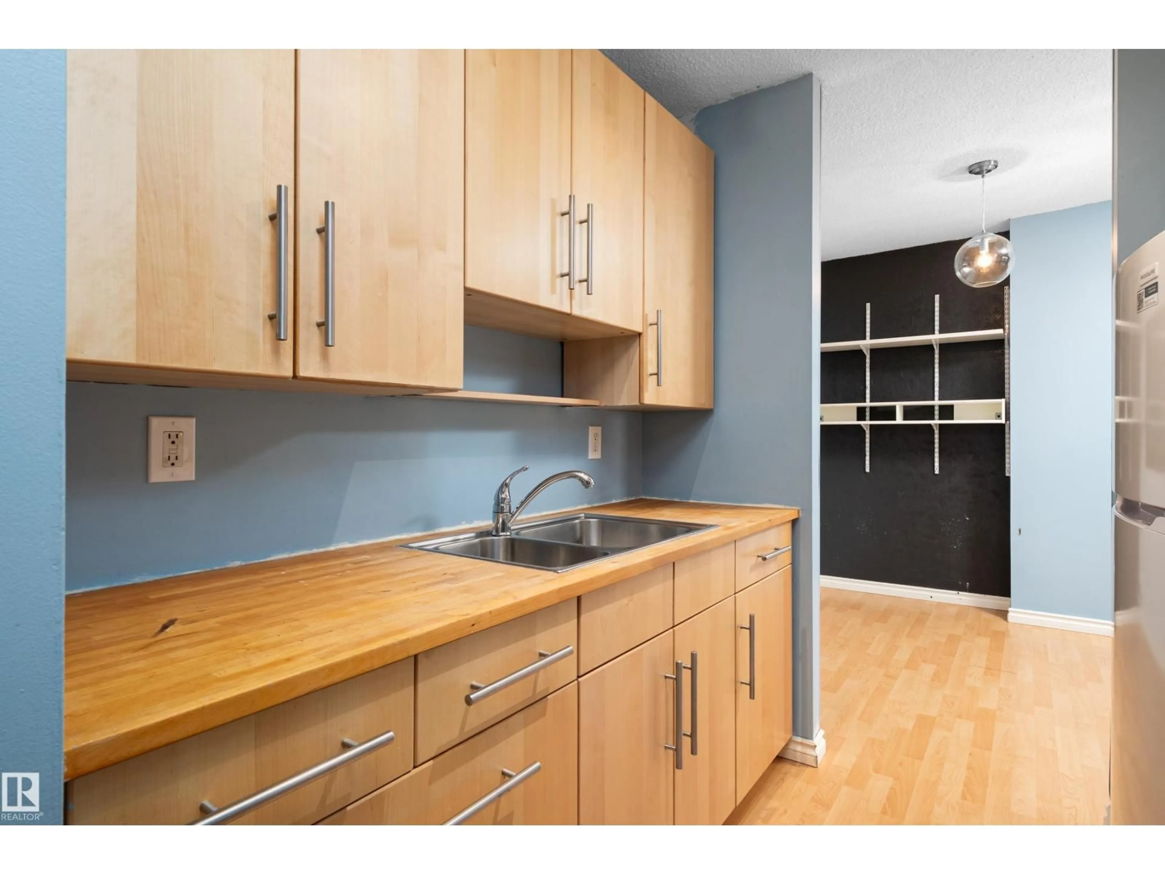 Standard kitchen, wood/laminate floor for 13910 - 611 STONY PLAIN RD, Edmonton Alberta T5N3R2