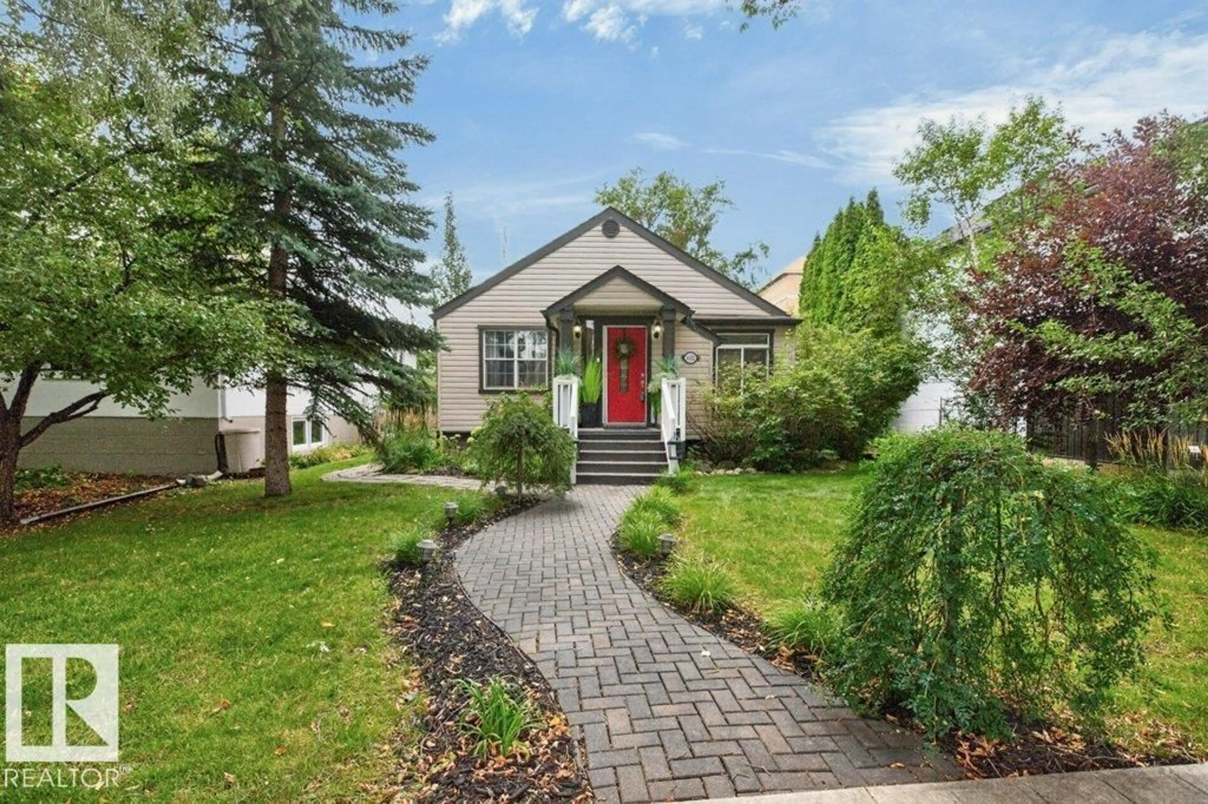 Home with brick exterior material, street for 14031 106 AV, Edmonton Alberta T5N1B3
