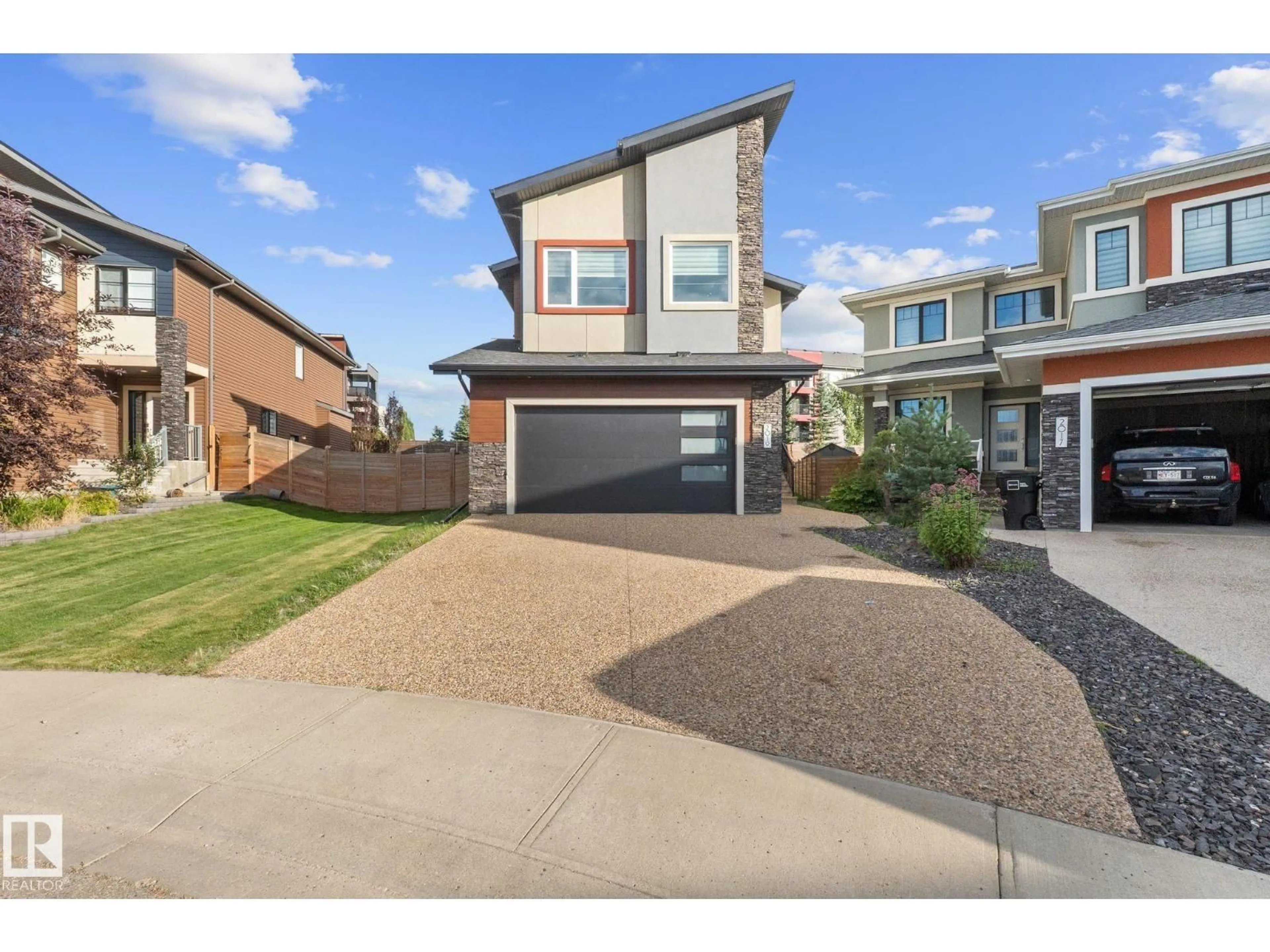 A pic from outside/outdoor area/front of a property/back of a property/a pic from drone, street for 2019 WARE RD, Edmonton Alberta T6W3G5