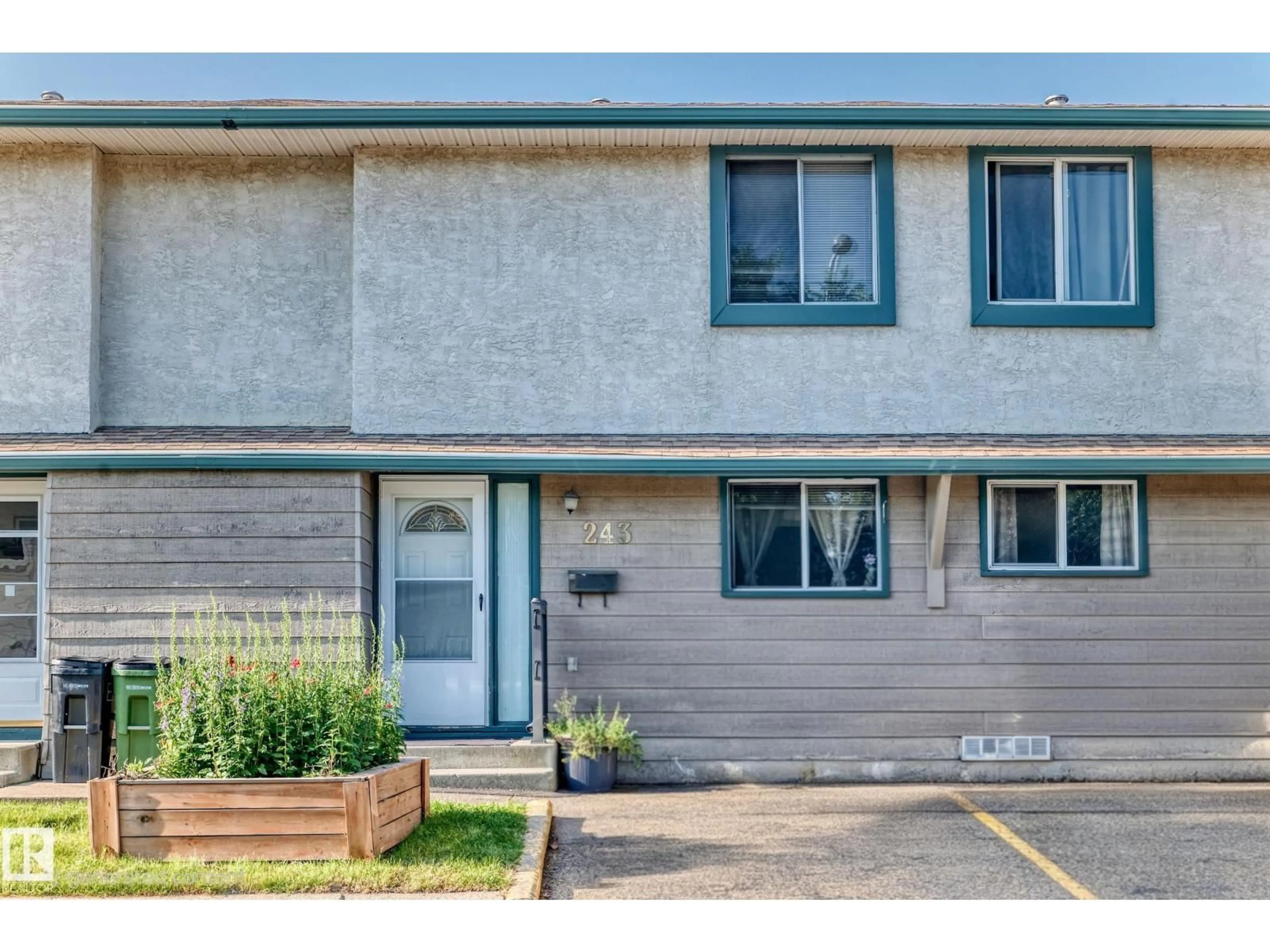 Home with vinyl exterior material, street for 243 ABBOTSFIELD RD, Edmonton Alberta T5W4S9