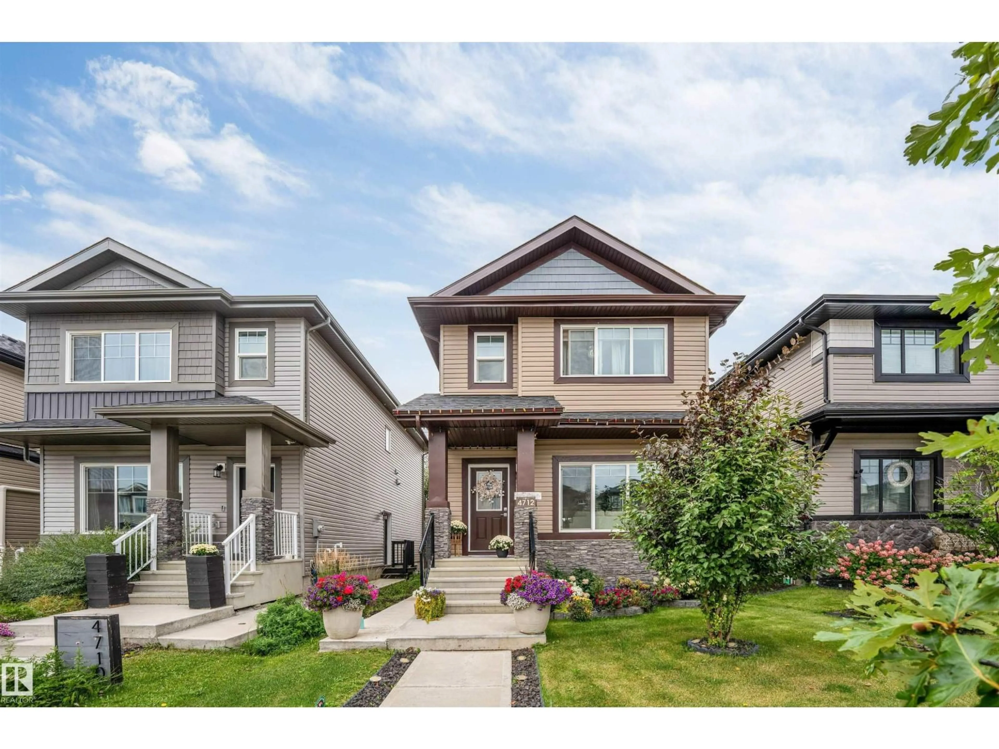 Home with vinyl exterior material, street for 4712 35 ST, Beaumont Alberta T4X2C4