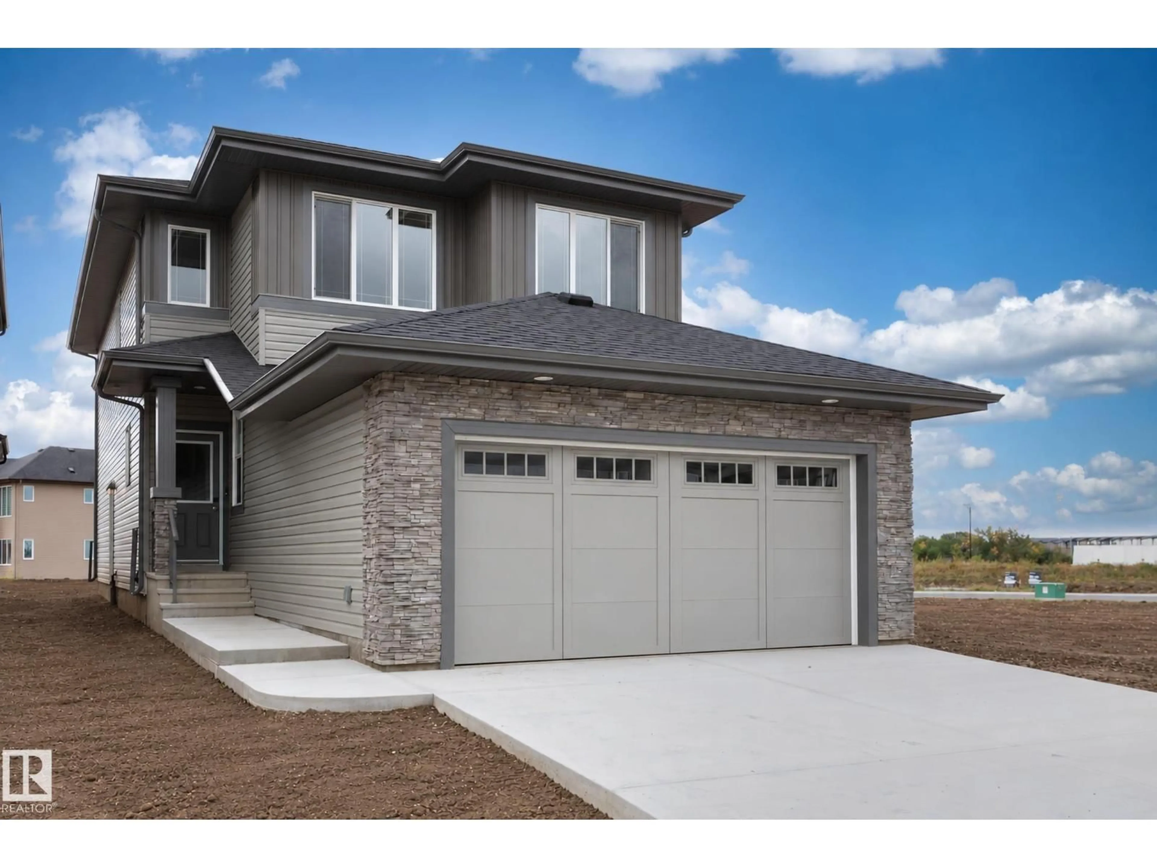 Home with vinyl exterior material, street for 6279 180 AV, Edmonton Alberta T5Y4L8