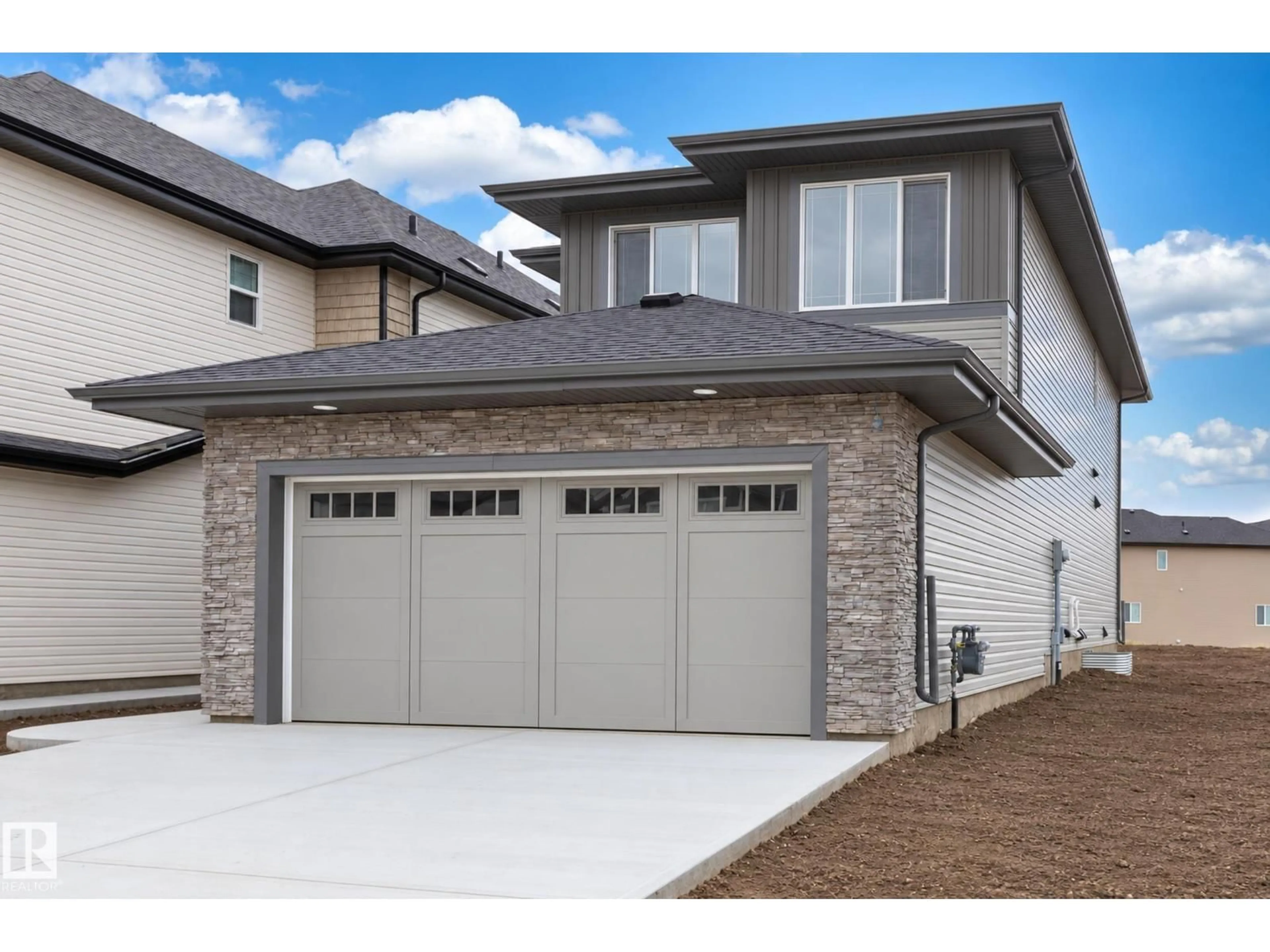 Home with vinyl exterior material, street for 6279 180 AV, Edmonton Alberta T5Y4L8