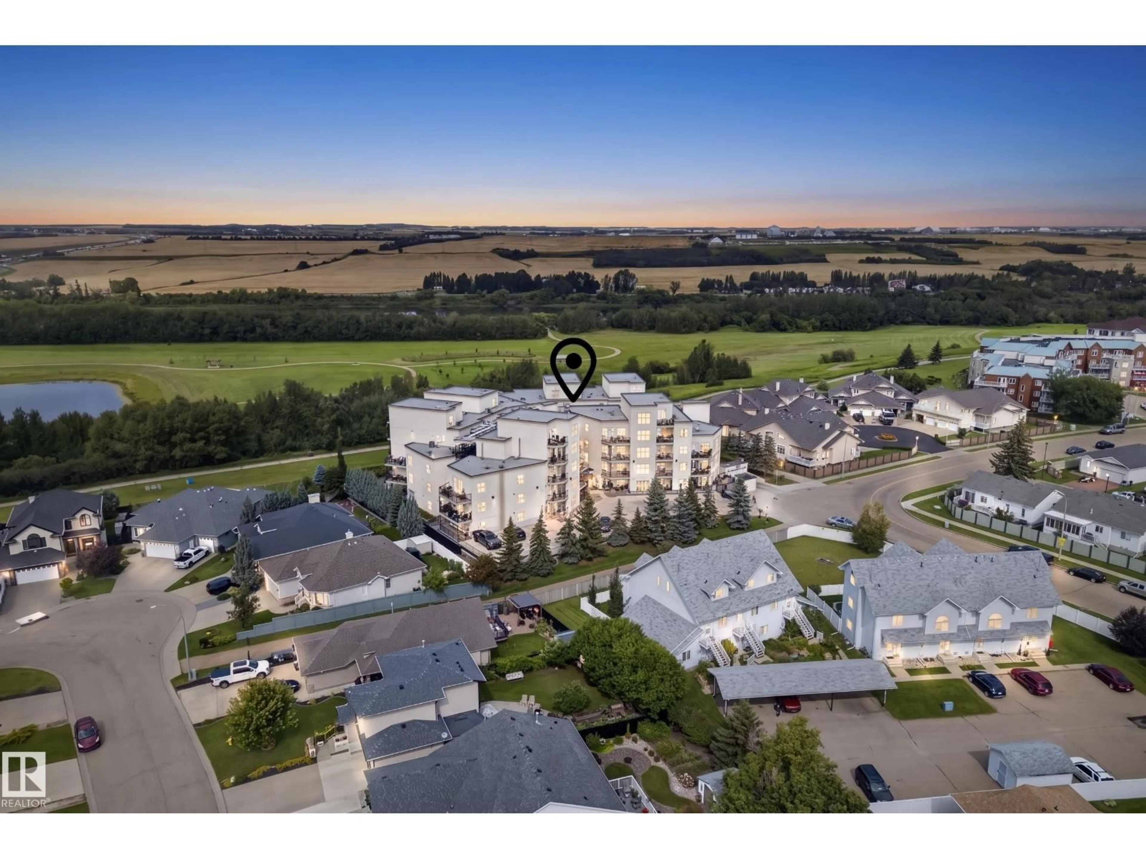 A pic from outside/outdoor area/front of a property/back of a property/a pic from drone, unknown for #407 - 9940 SHERRIDON DR, Fort Saskatchewan Alberta T8L4C9