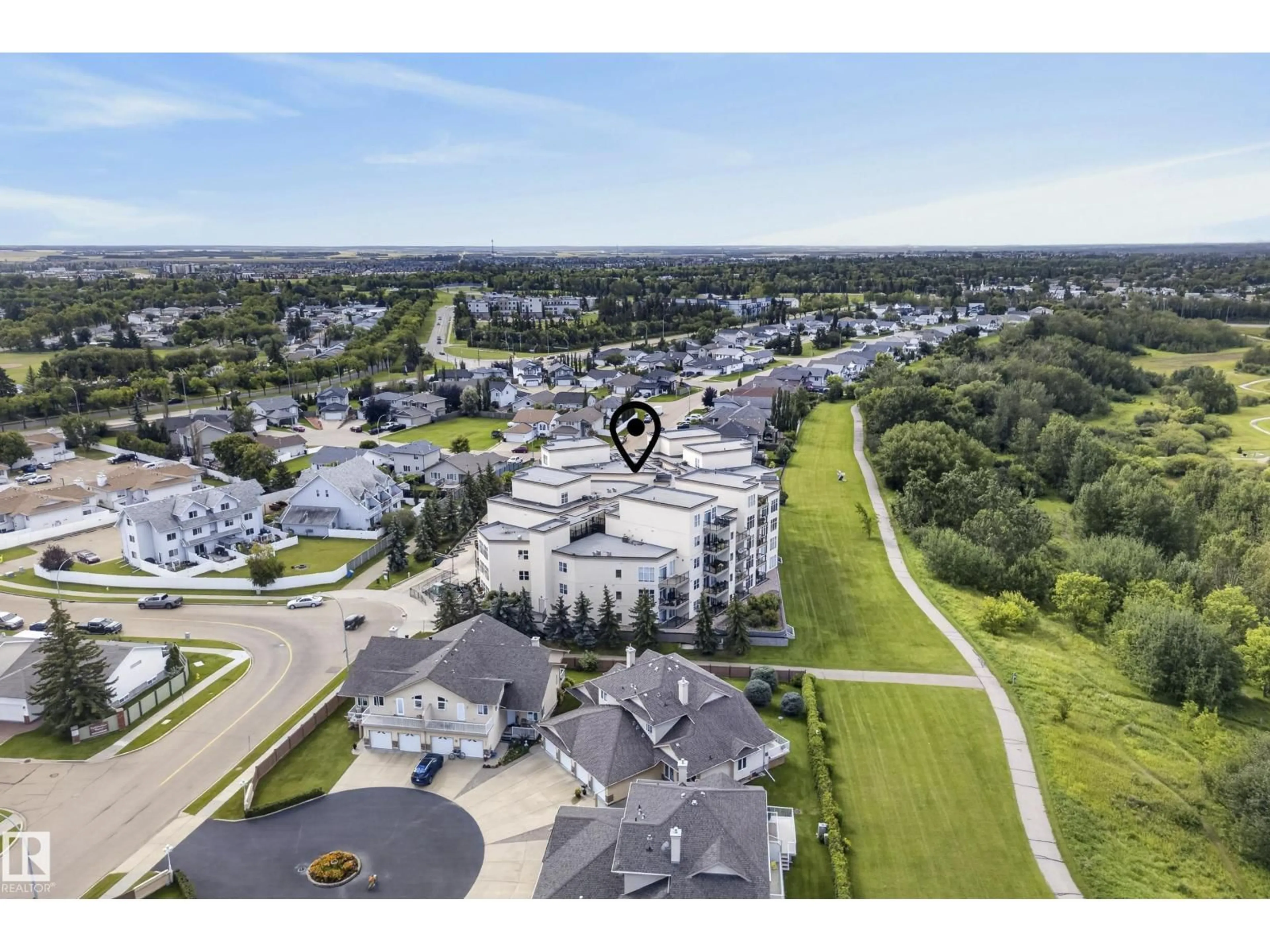 A pic from outside/outdoor area/front of a property/back of a property/a pic from drone, unknown for #407 - 9940 SHERRIDON DR, Fort Saskatchewan Alberta T8L4C9