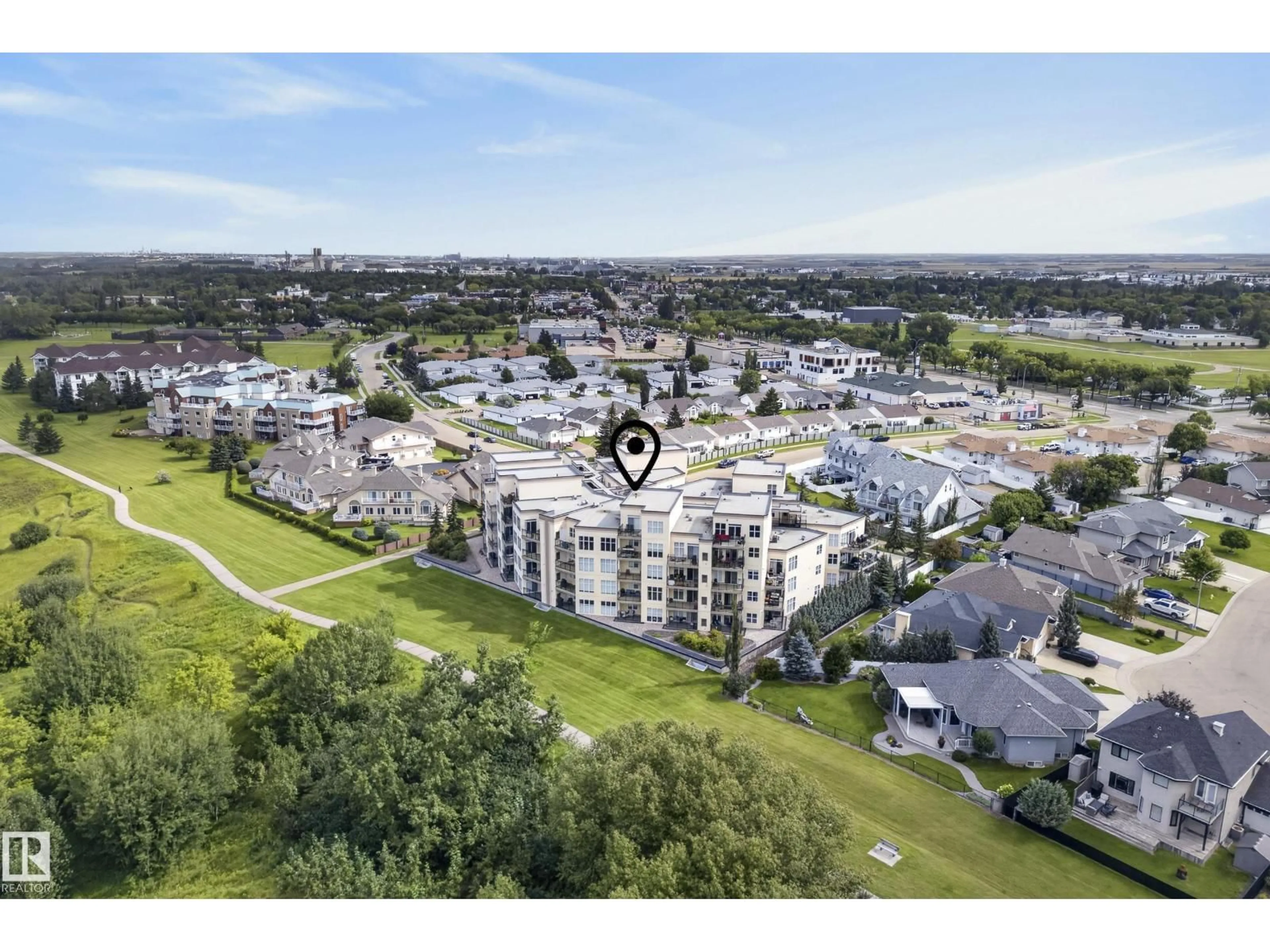 A pic from outside/outdoor area/front of a property/back of a property/a pic from drone, city buildings view from balcony for #407 - 9940 SHERRIDON DR, Fort Saskatchewan Alberta T8L4C9