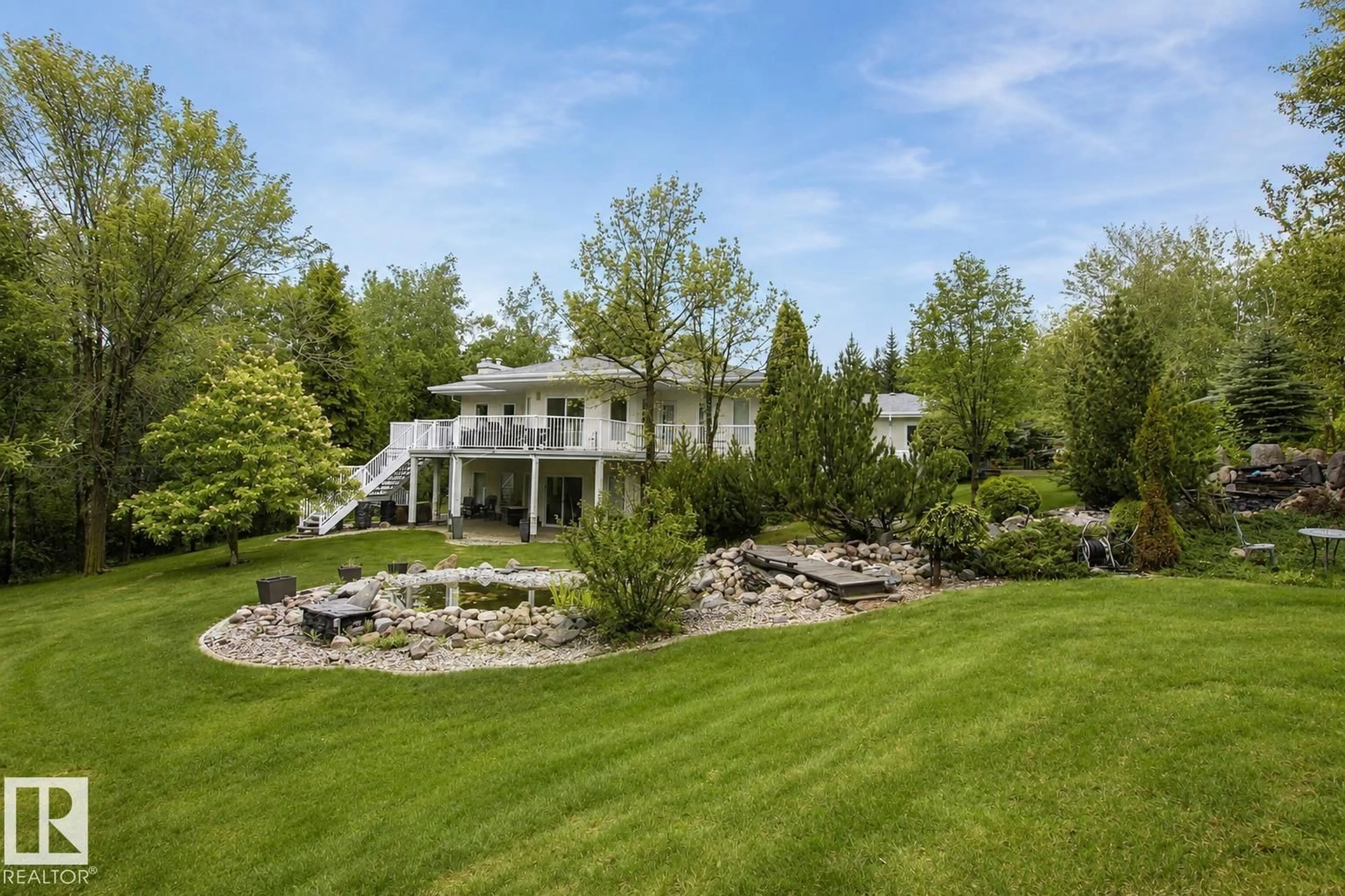 A pic from outside/outdoor area/front of a property/back of a property/a pic from drone, water/lake/river/ocean view for 52258 RGE ROAD 231, Rural Strathcona County Alberta T8B1M8