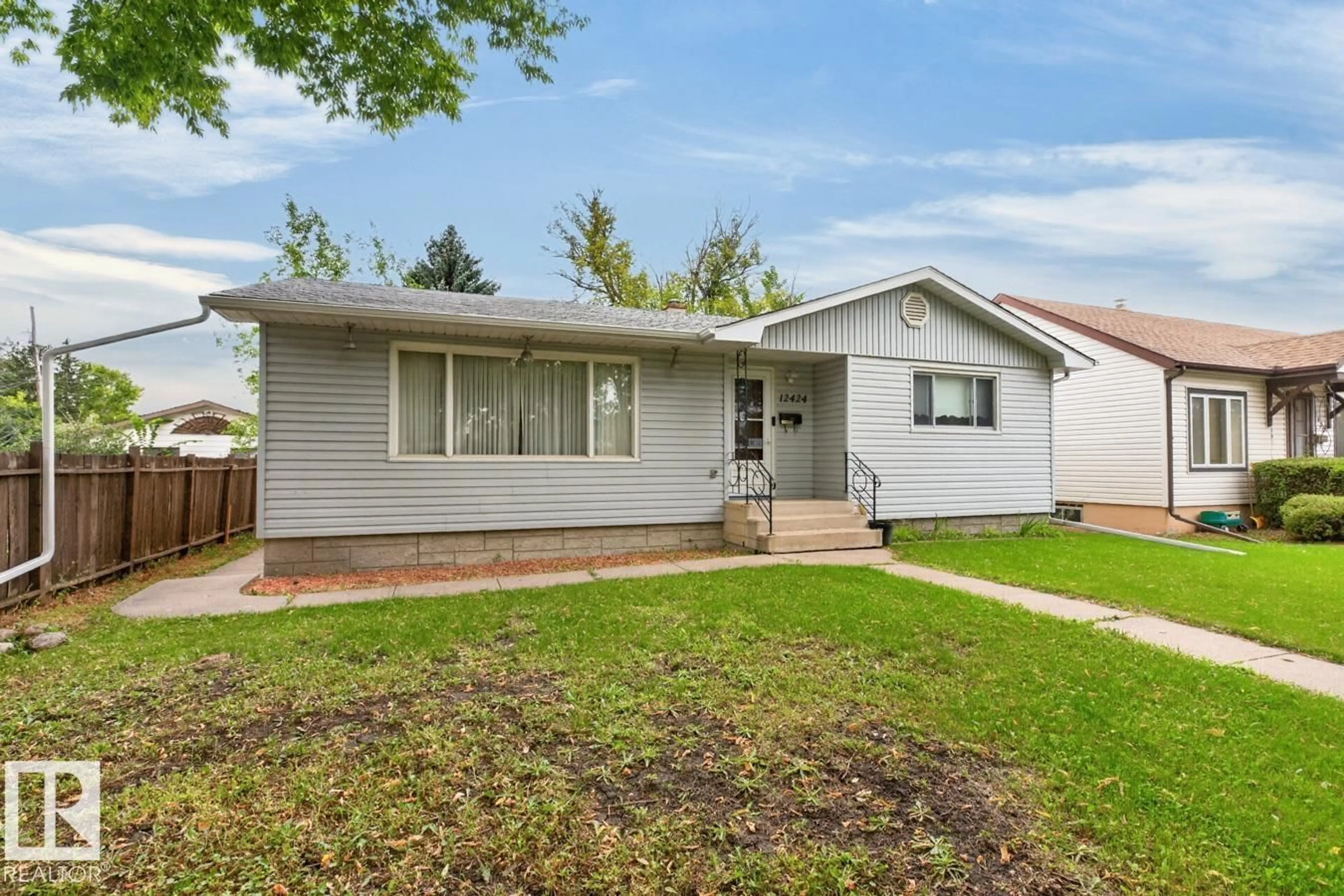 Home with vinyl exterior material, street for NW - 12424 77 ST, Edmonton Alberta T5B2H5