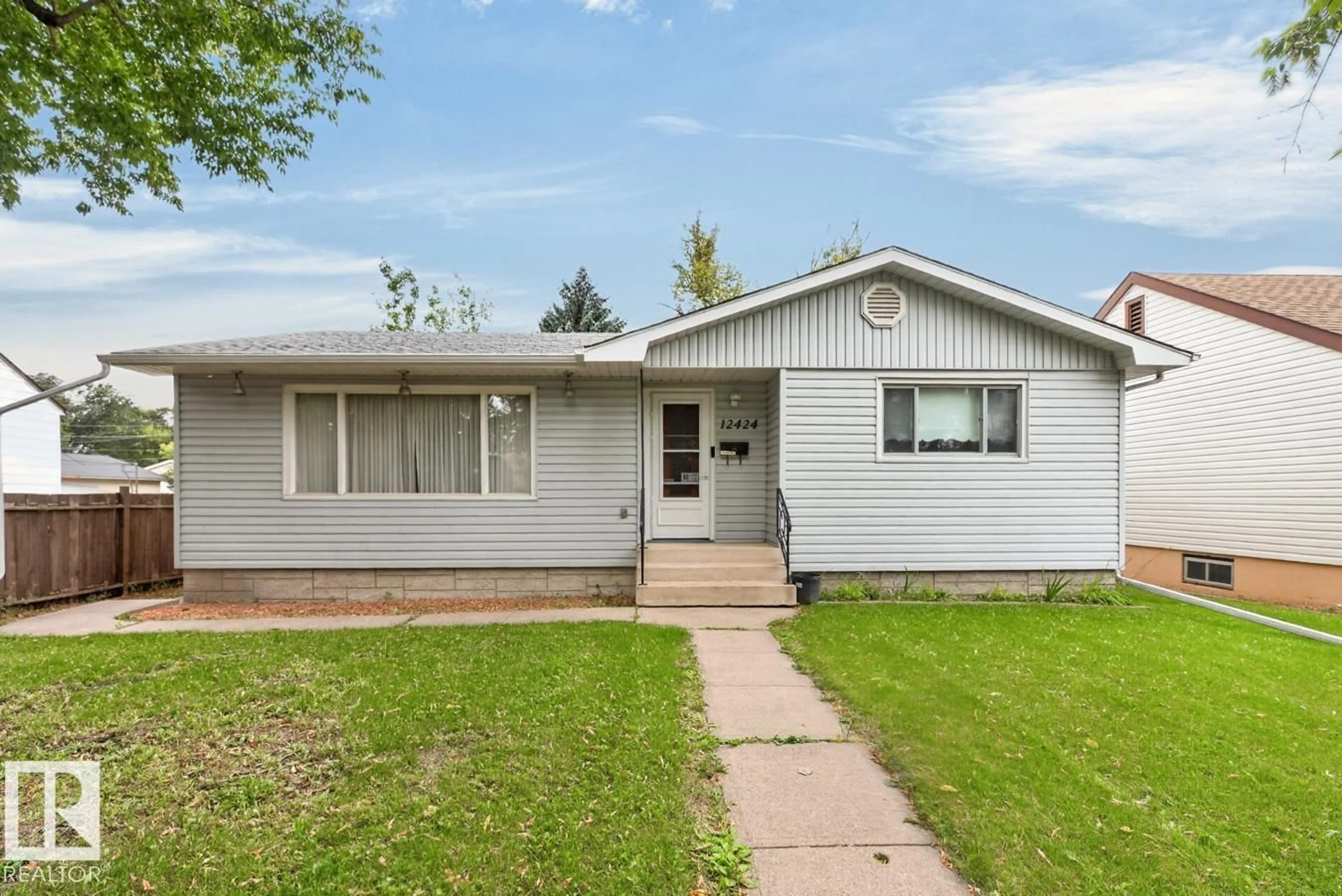 Home with vinyl exterior material, street for NW - 12424 77 ST, Edmonton Alberta T5B2H5