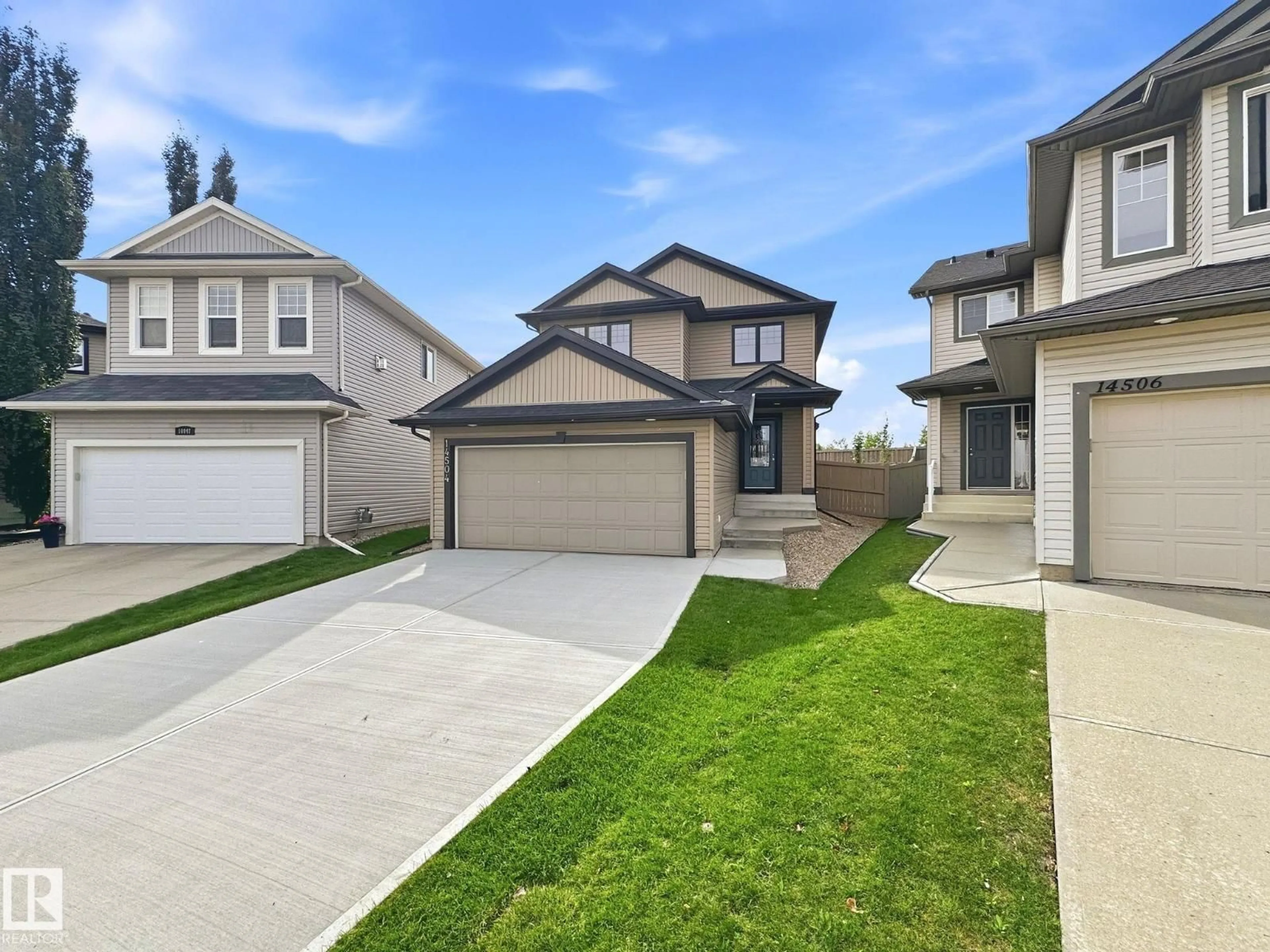 Home with vinyl exterior material, street for NW - 14504 141 ST, Edmonton Alberta T6V1Y2