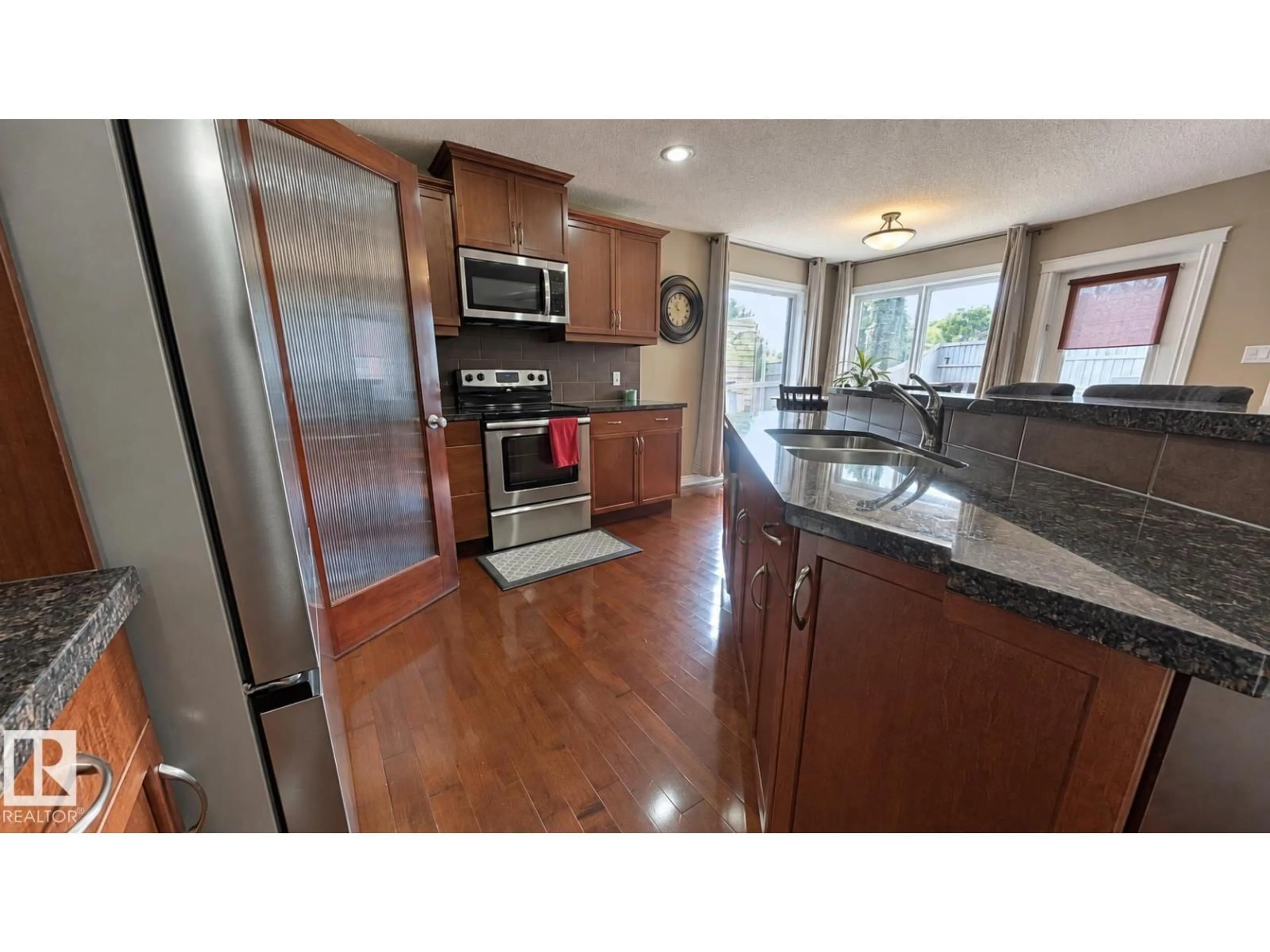 Open concept kitchen, ceramic/tile floor for NW - 14504 141 ST, Edmonton Alberta T6V1Y2