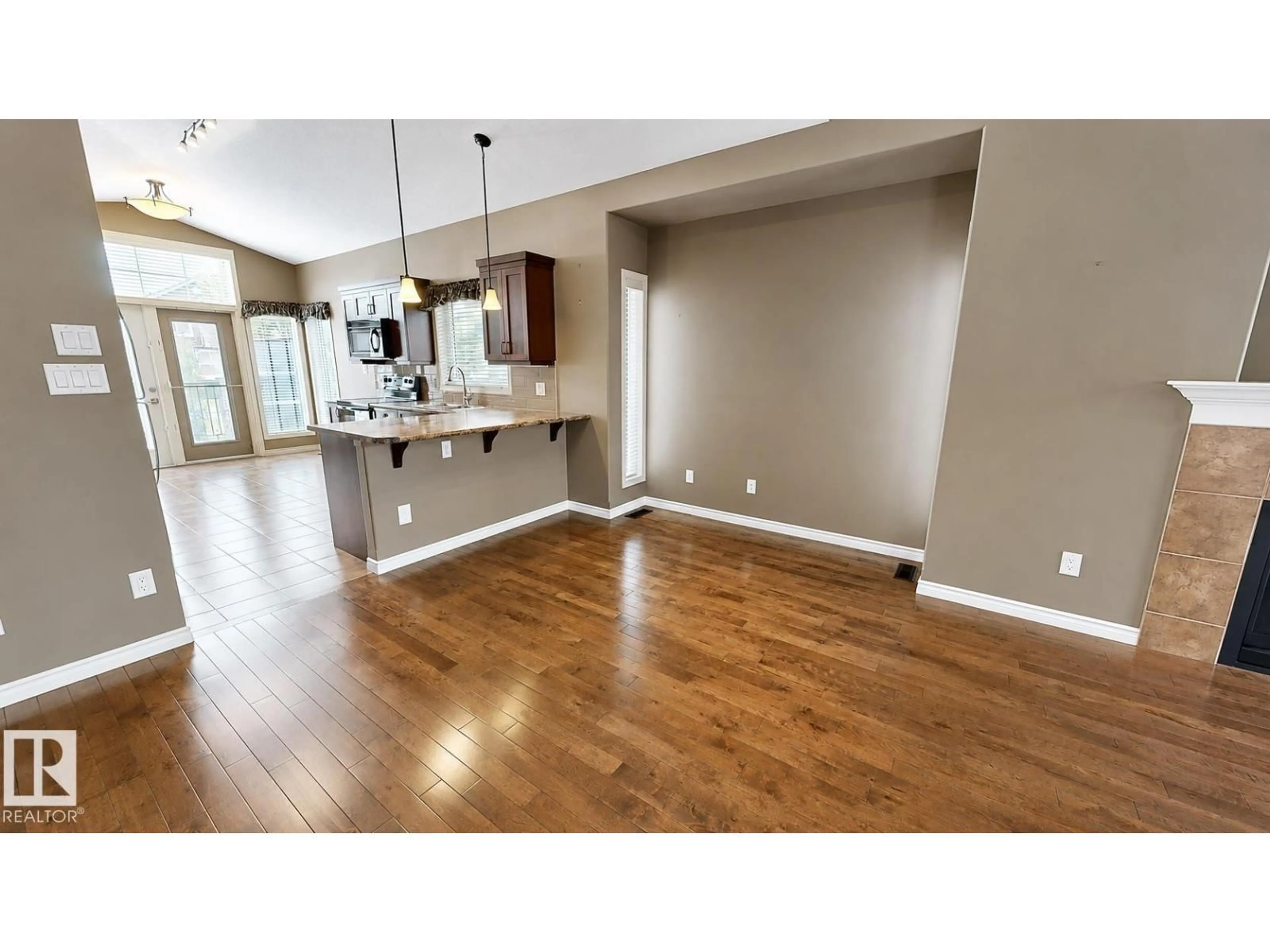 Open concept kitchen, wood/laminate floor for 17 - 4001 ETON, Sherwood Park Alberta T8H0N8
