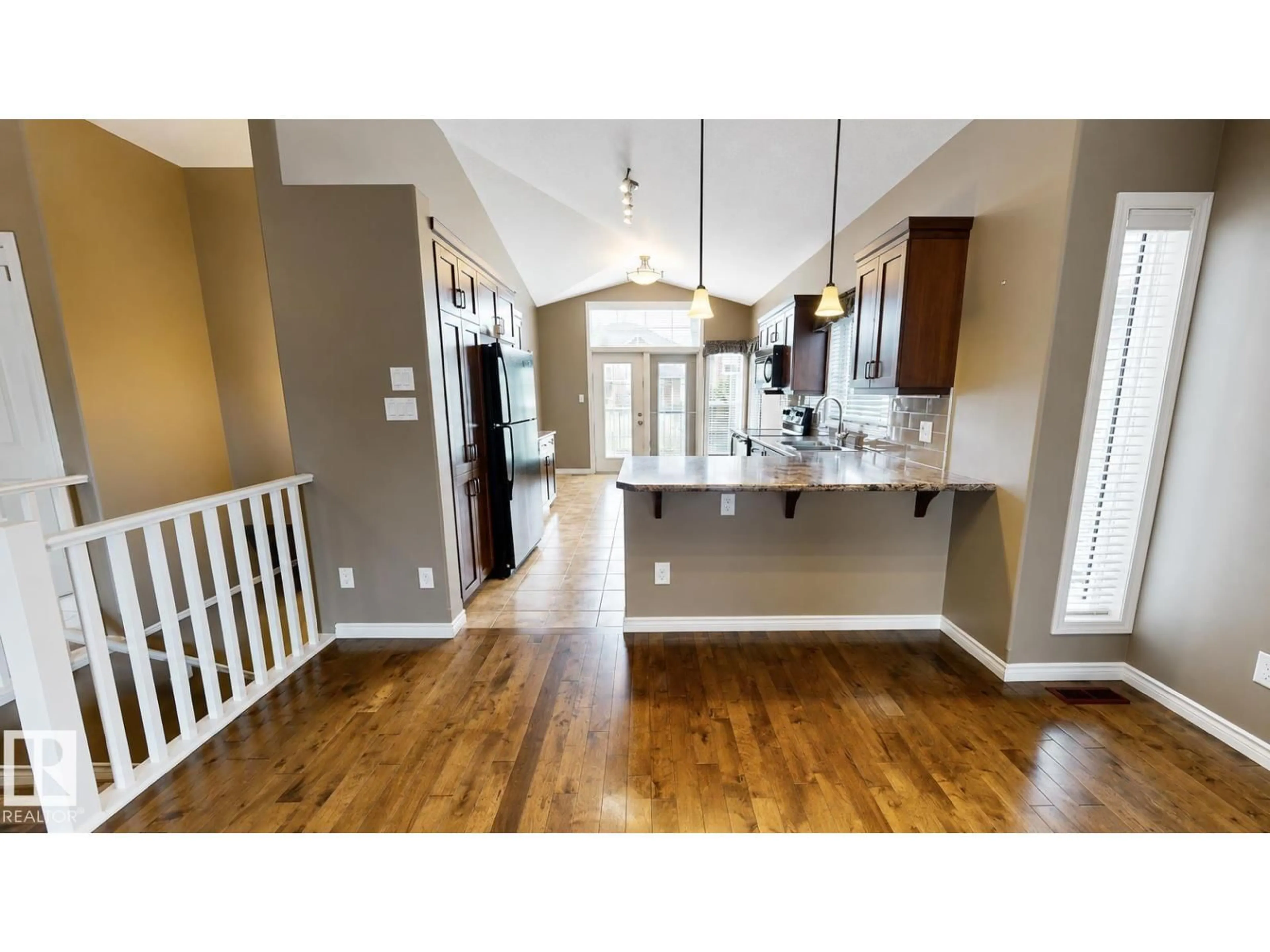Open concept kitchen, wood/laminate floor for 17 - 4001 ETON, Sherwood Park Alberta T8H0N8
