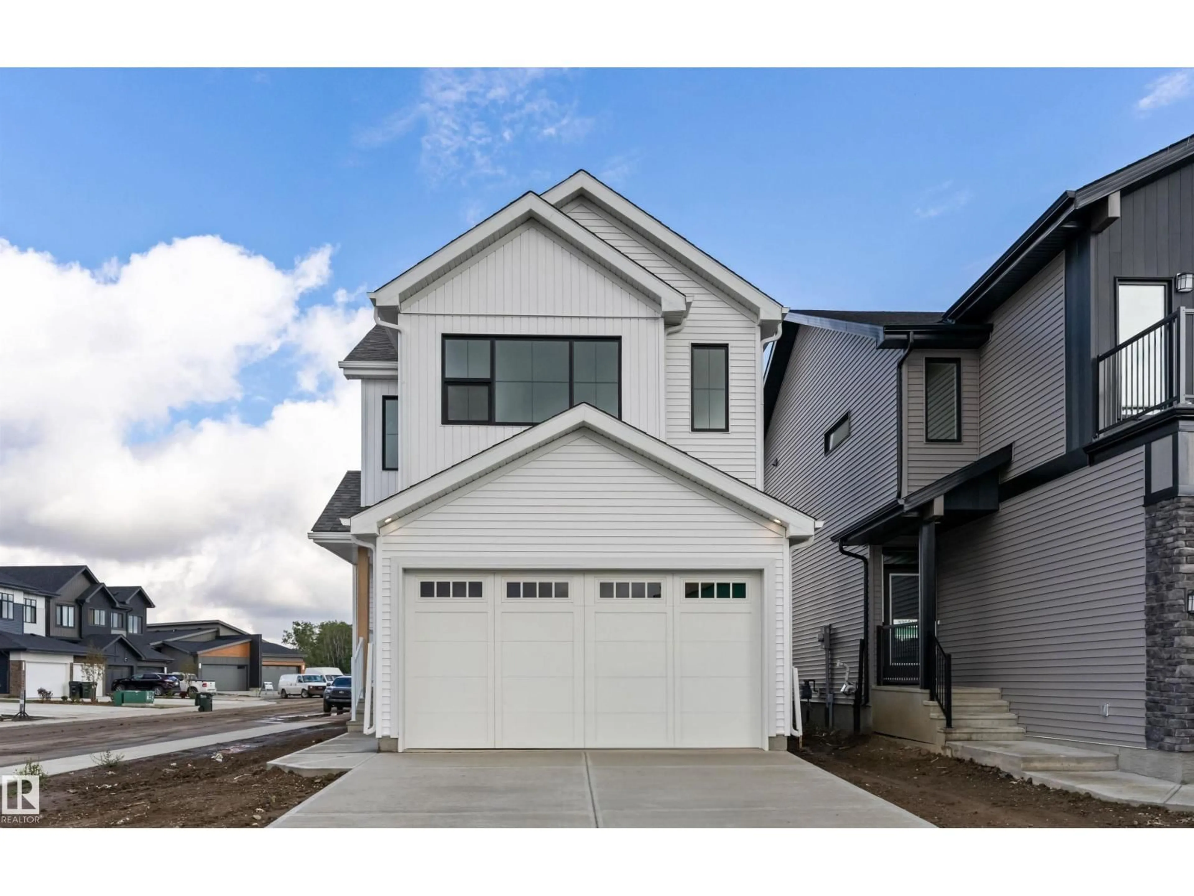 Home with vinyl exterior material, street for 210 STETSON LO, Ardrossan Alberta T8E0C1