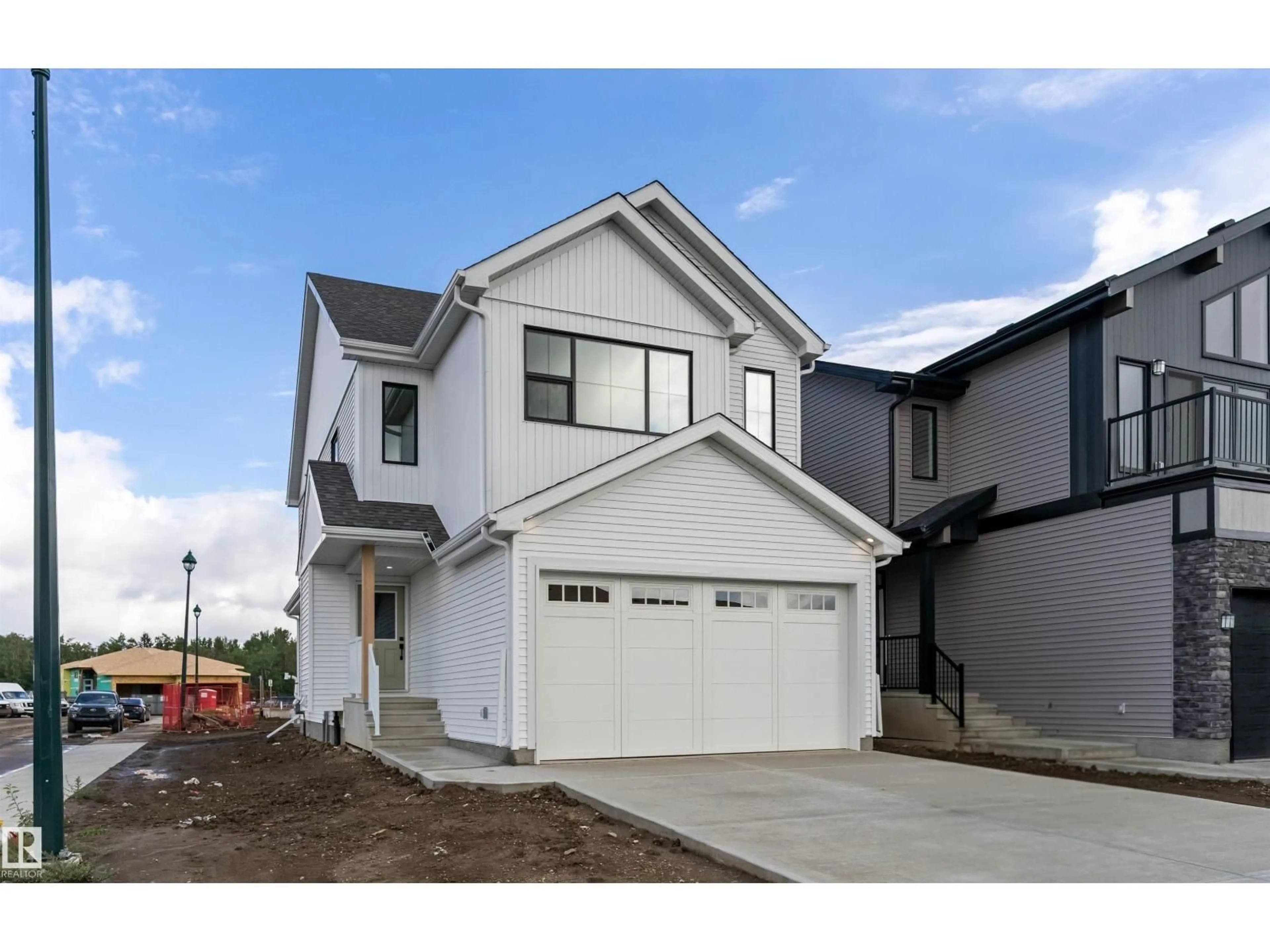 Home with vinyl exterior material, street for 210 STETSON LO, Ardrossan Alberta T8E0C1