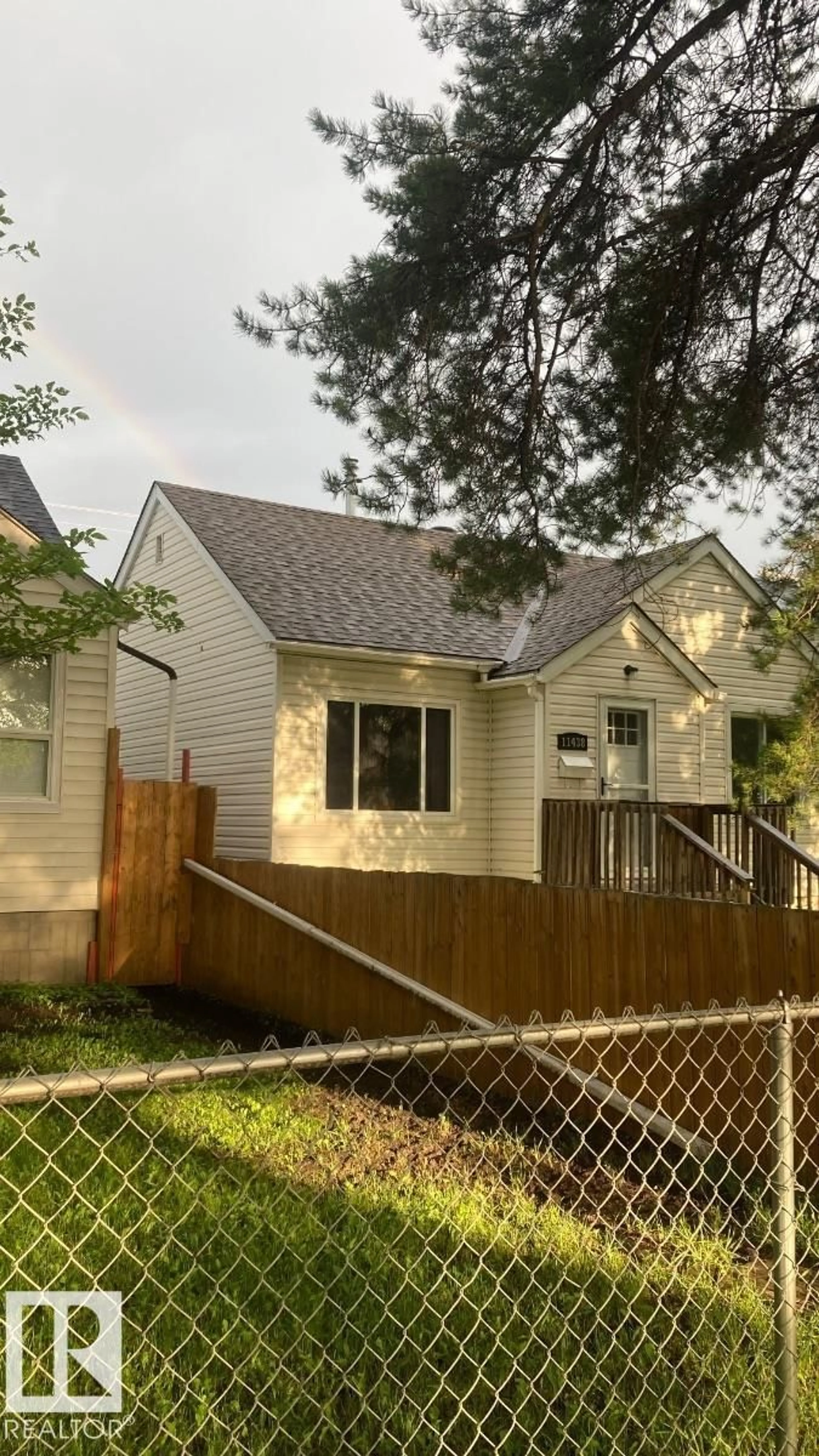Home with vinyl exterior material, street for NW - 11438 83 ST, Edmonton Alberta T5B2Y3