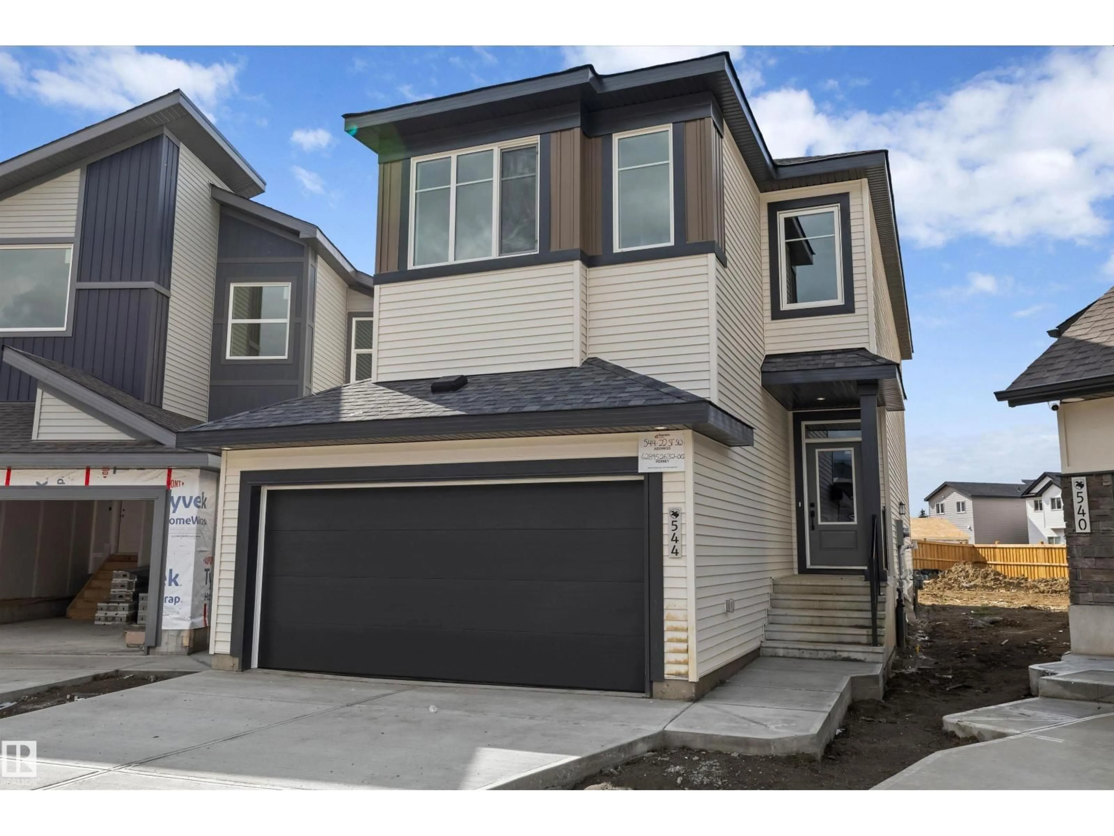 Home with vinyl exterior material, street for SW - 544 22 ST, Edmonton Alberta T6X3M1