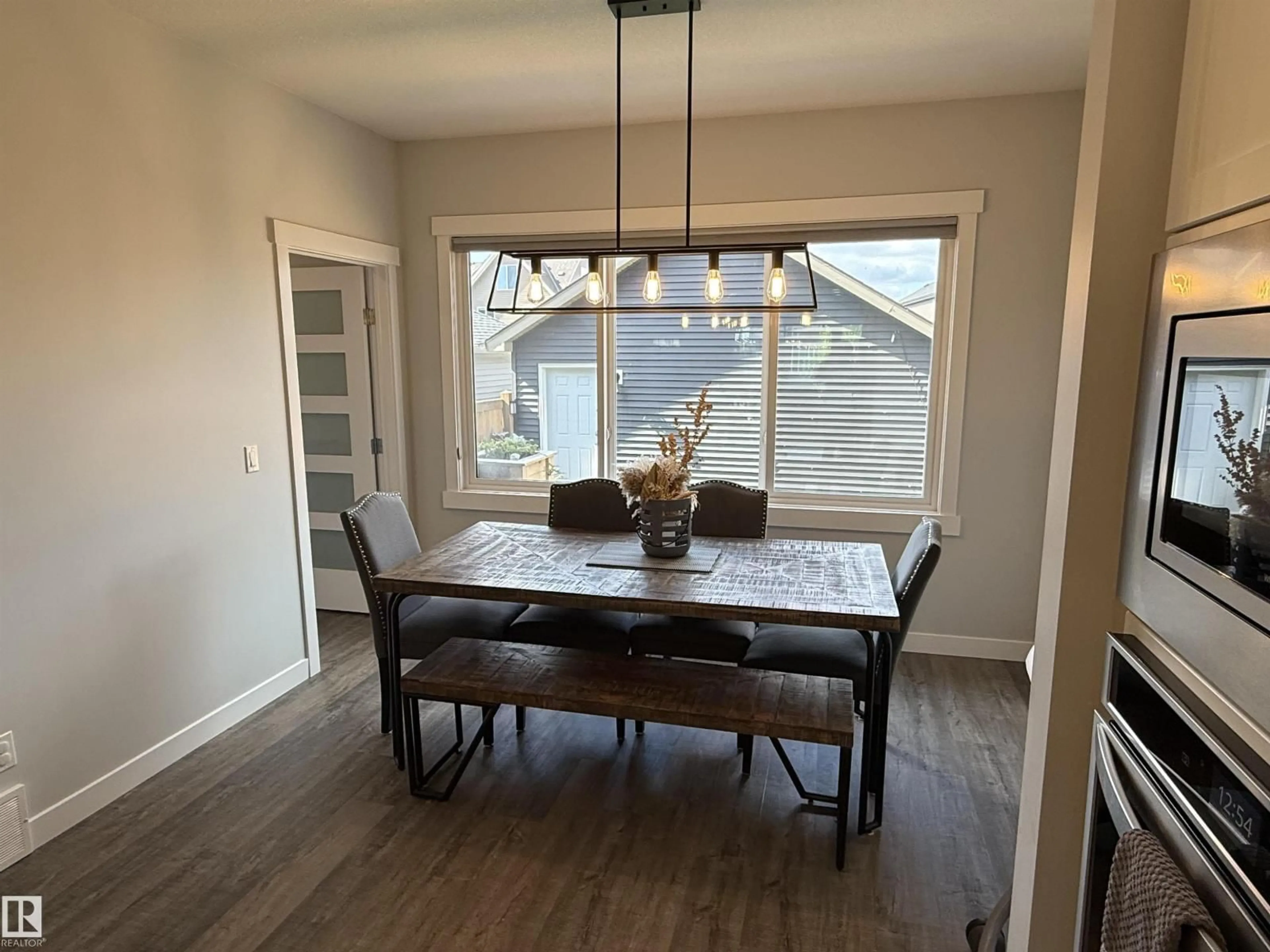 Dining room, wood/laminate floor for NW - 17468 77 ST, Edmonton Alberta T5Z0R4