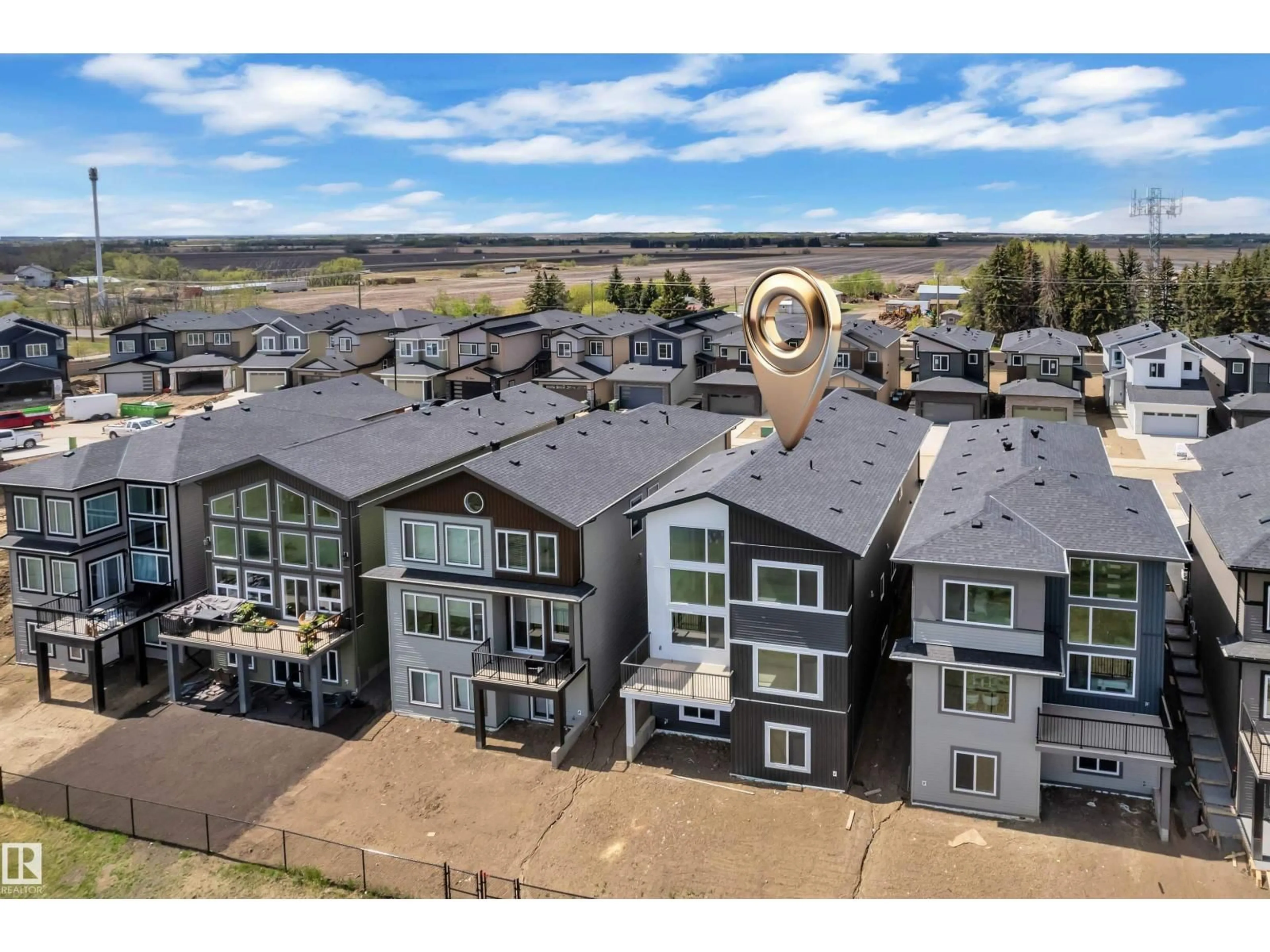 A pic from outside/outdoor area/front of a property/back of a property/a pic from drone, mountain view for 226 LINDEN LO, Leduc Alberta T9E1T2