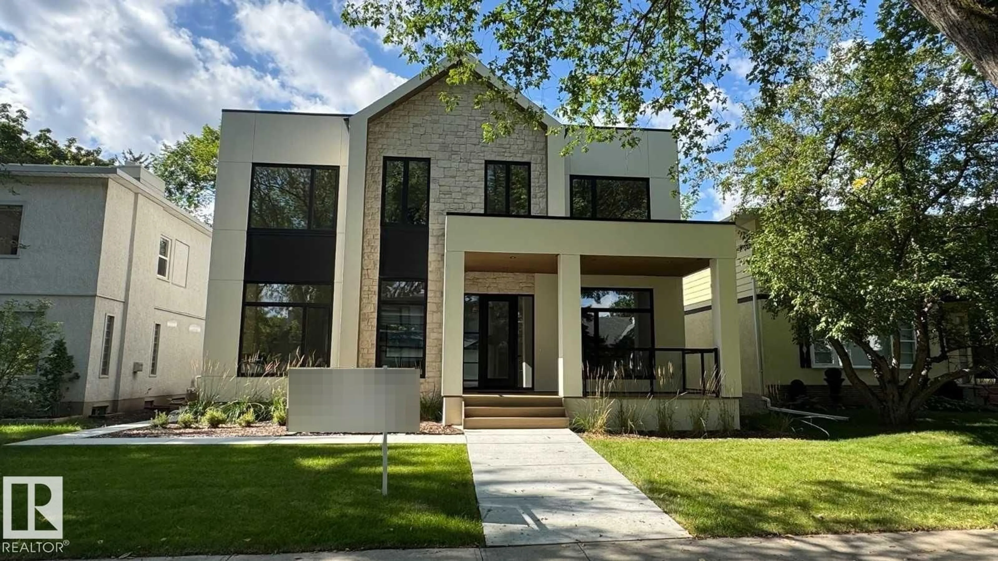 Home with brick exterior material, street for NW - 10514 134 ST, Edmonton Alberta T5N2B5