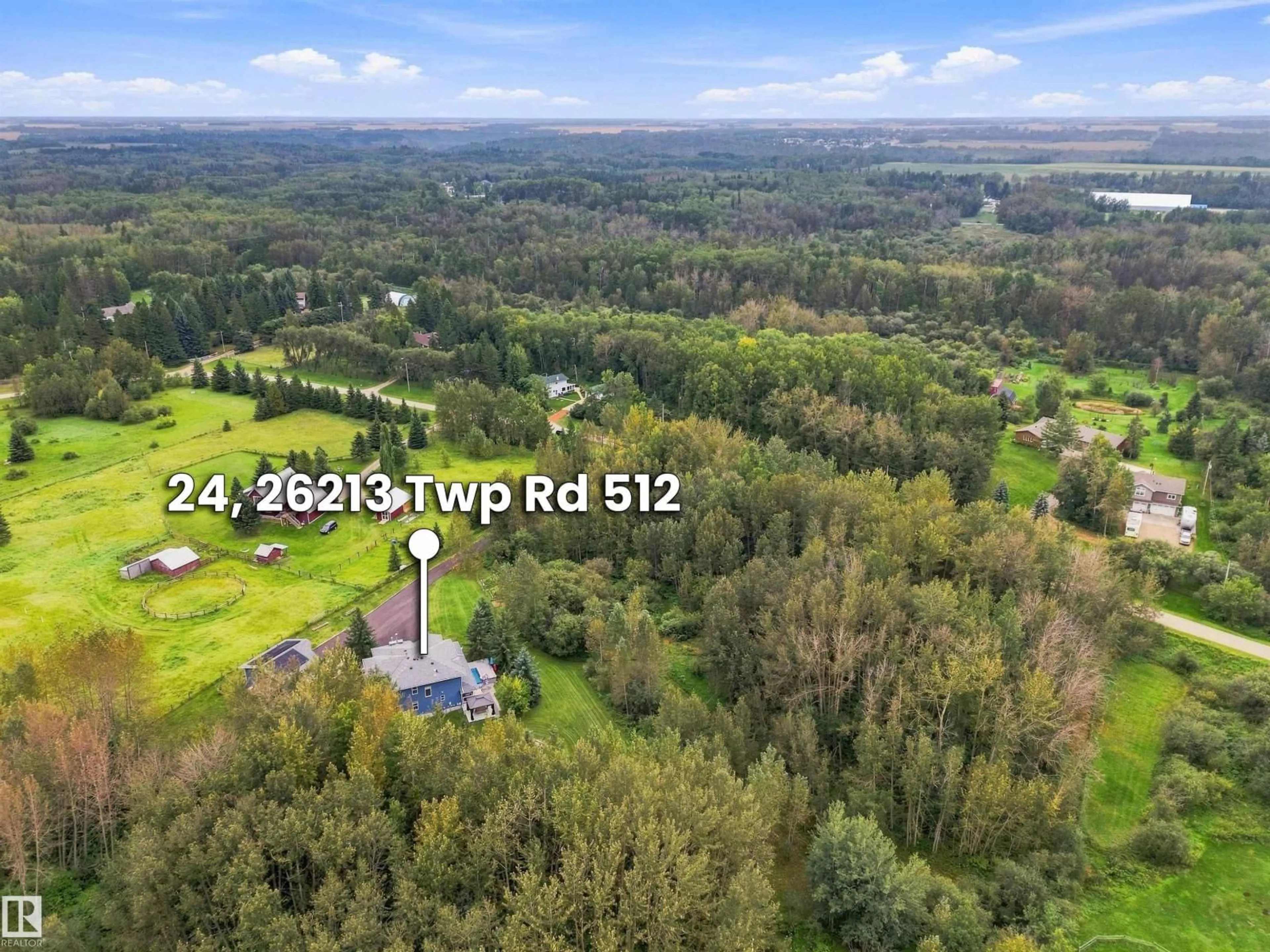 A pic from outside/outdoor area/front of a property/back of a property/a pic from drone, forest/trees view for 24 TWP ROAD 512 TWP ROAD, Rural Parkland County Alberta T7Y1C6