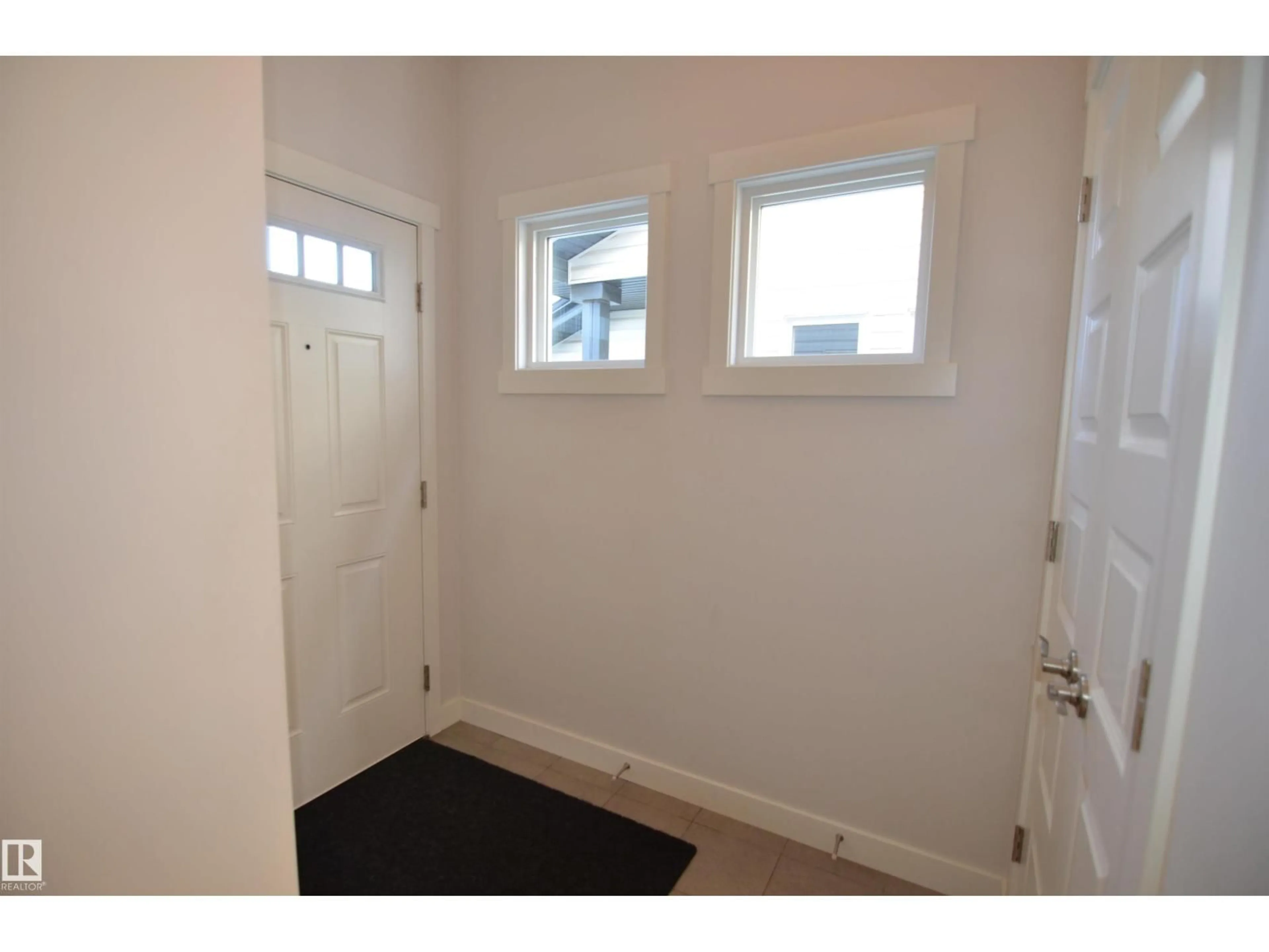Indoor entryway for 20745 99A AV, Edmonton Alberta T5T7G4