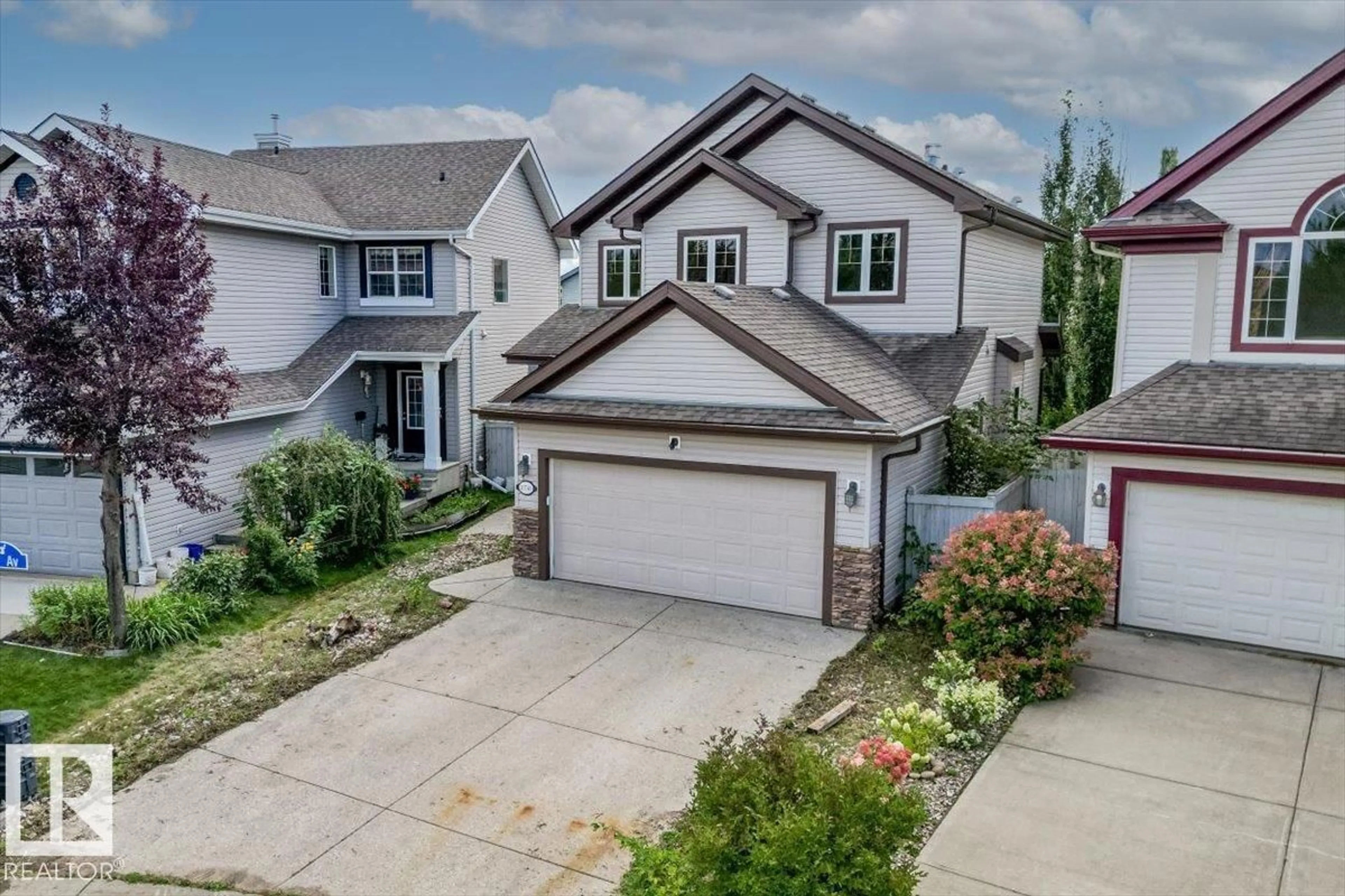 A pic from outside/outdoor area/front of a property/back of a property/a pic from drone, street for 20743 56 AV, Edmonton Alberta T6M0B7
