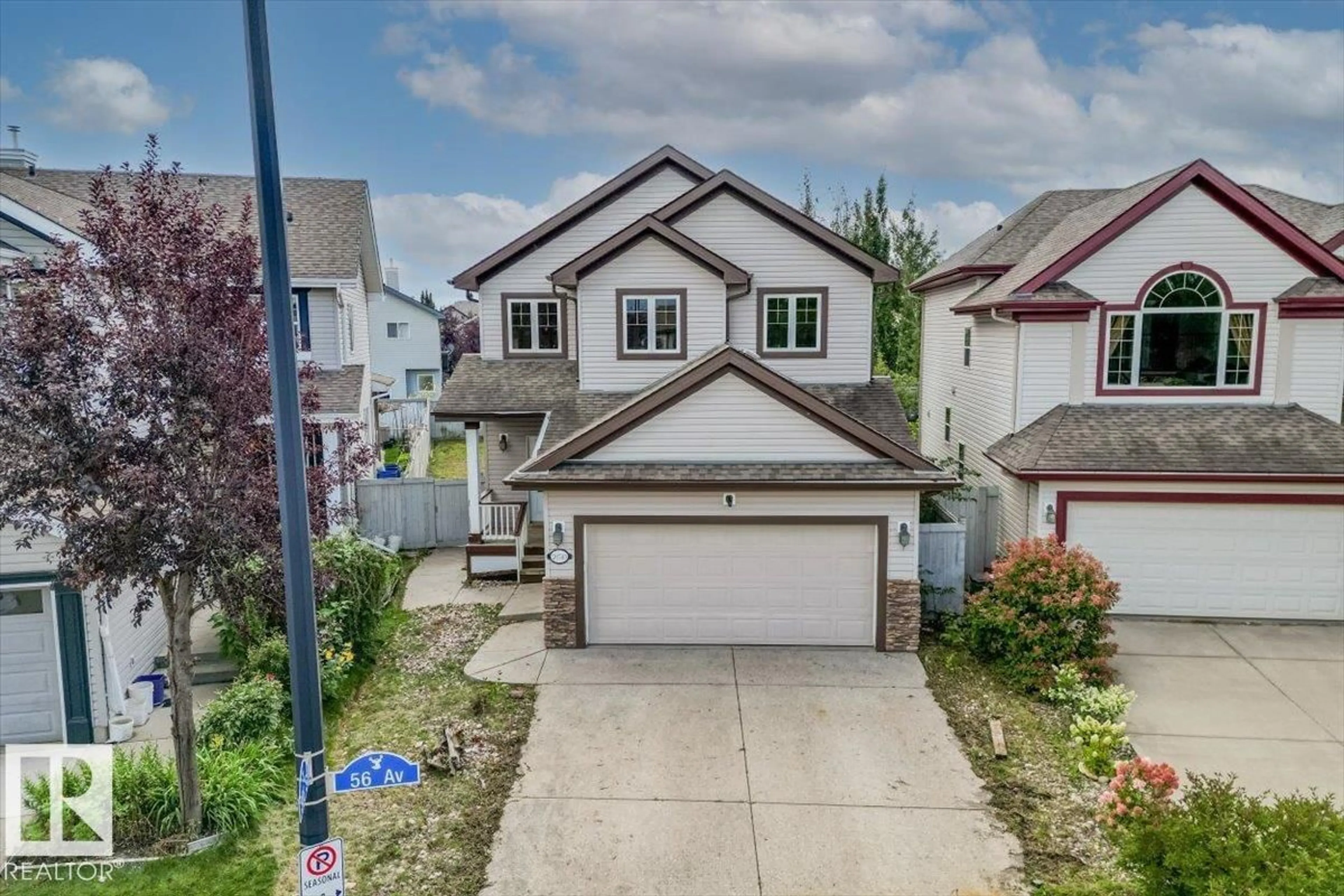 A pic from outside/outdoor area/front of a property/back of a property/a pic from drone, street for 20743 56 AV, Edmonton Alberta T6M0B7